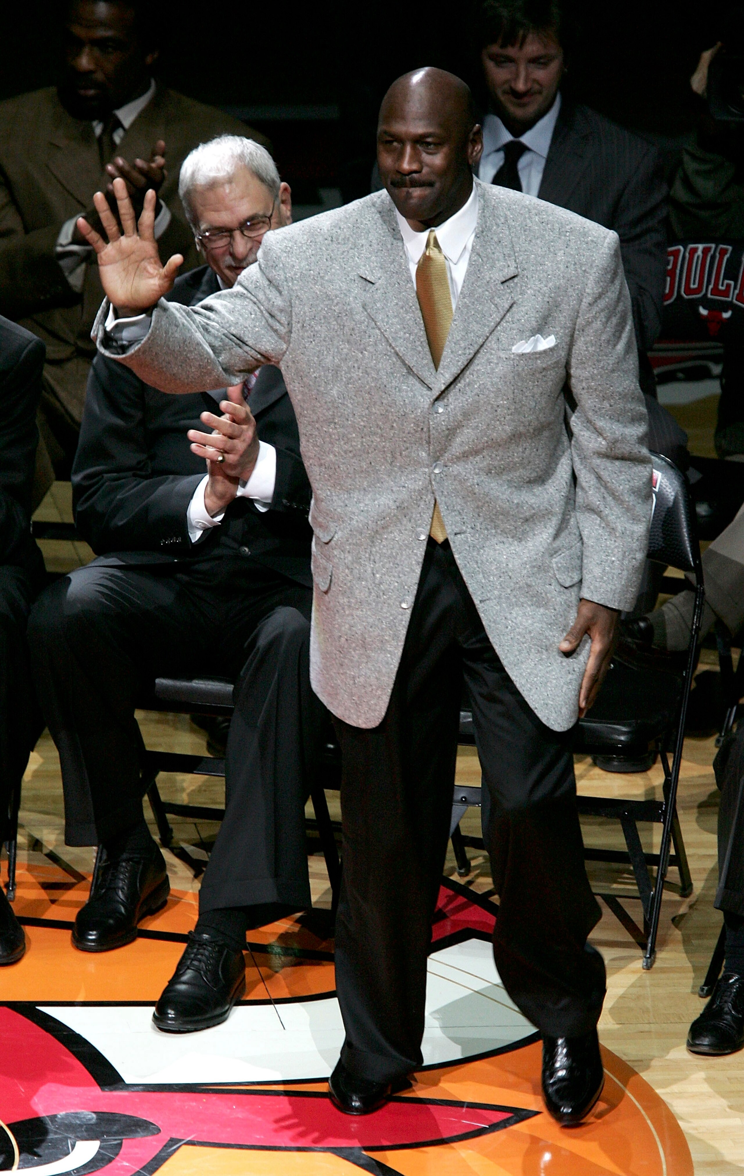 CHICAGO - DECEMBER 9:  Michael Jordan, formerly of the Chicago Bulls, waves to the crowd during a ceremony retiring former teammate Scottie Pippen's #33 at halftime of a game between the Bulls and the Los Angeles Lakers on December 9, 2005 at the United C