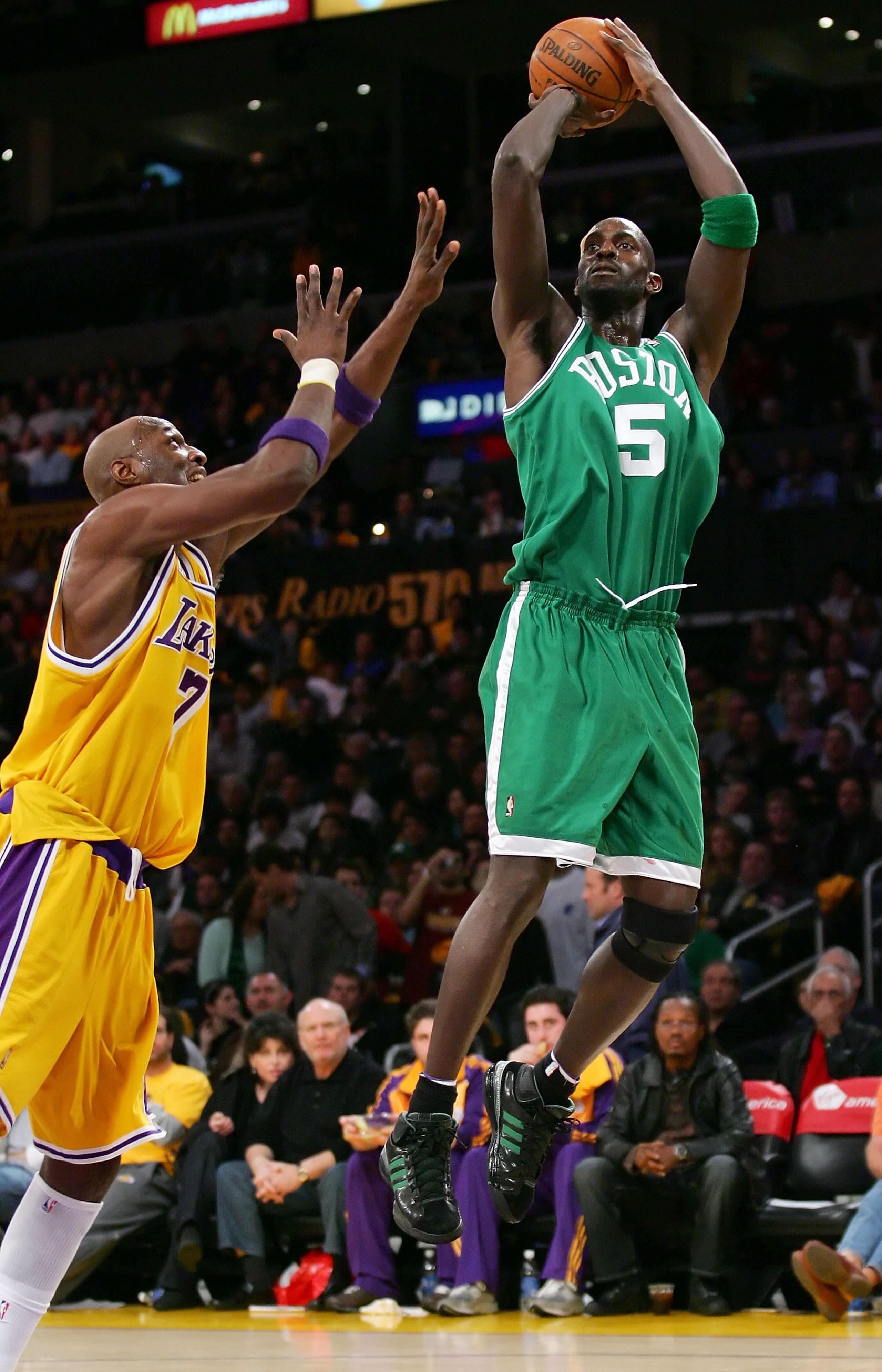 LOS ANGELES - DECEMBER 30:  Kevin Garnett #5 of the Boston Celtics puts a shot up against Lamar Odom #7 of the Los Angeles Lakers at Staples Center December 30, 2007 in Los Angeles, California.  NOTE TO USER: User expressly acknowledges and agrees that, b