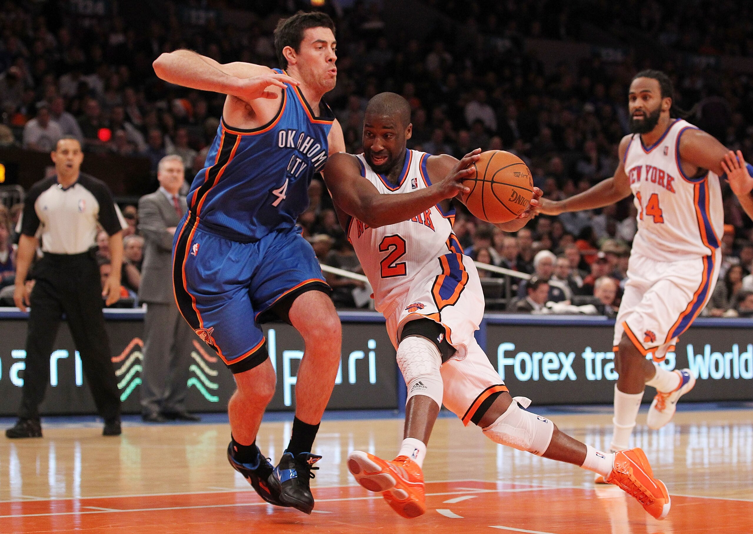NEW YORK, NY - DECEMBER 22:  Raymond Felton #2 of the New York Knicks drives against Anthony Randolph #4 of the Oklahoma City Thunder at Madison Square Garden on December 22, 2010 in New York City.   NOTE TO USER: User expressly acknowledges and agrees th