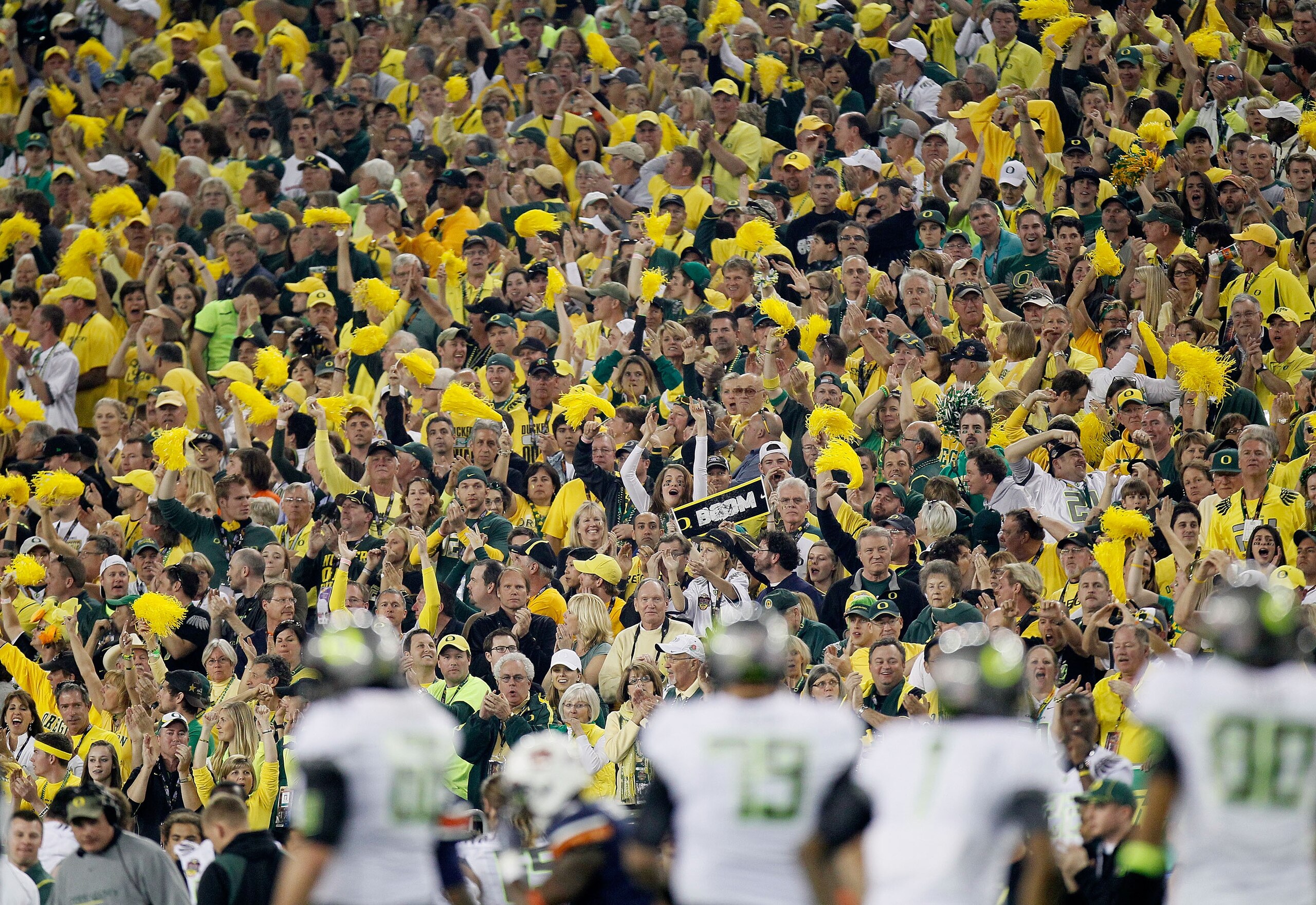 GLENDALE, AZ - JANUARY 10: Oregon Ducks fans attend their Tostitos BCS National Championship Game against the Auburn Tigers at University of Phoenix Stadium on January 10, 2011 in Glendale, Arizona. (Photo by Kevin C. Cox/Getty Images) GLENDALE, AZ - JANUARY 10: Oregon Ducks fans attend their Tostitos BCS National Championship Game against the Auburn Tigers at University of Phoenix Stadium on January 10, 2011 in Glendale, Arizona. (Photo by Kevin C. Cox/Getty Images)
