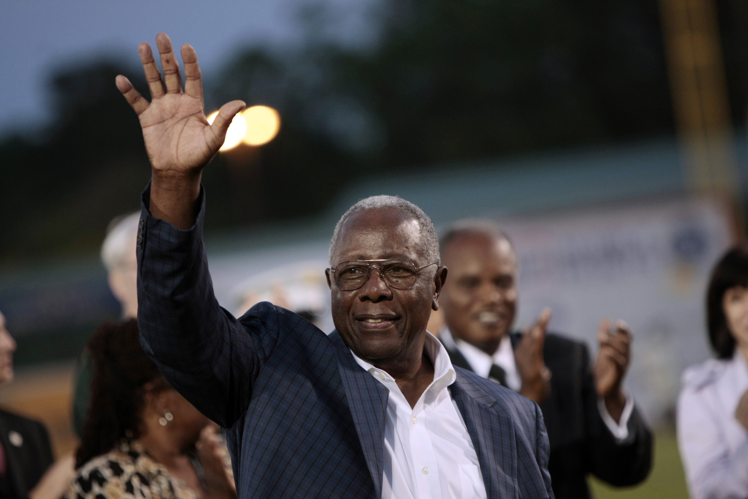 MOBILE, AL - APRIL 14: MLB Hall of Famer Hank Aaron waves to fans during pre-game ceremonies following the opening the Hank Aaron Museum at the Hank Aaron Stadium on April 14, 2010 in Mobile, Alabama. (Photo by Dave Martin/Getty Images) MOBILE, AL - APRIL 14: MLB Hall of Famer Hank Aaron waves to fans during pre-game ceremonies following the opening the Hank Aaron Museum at the Hank Aaron Stadium on April 14, 2010 in Mobile, Alabama. (Photo by Dave Martin/Getty Images)