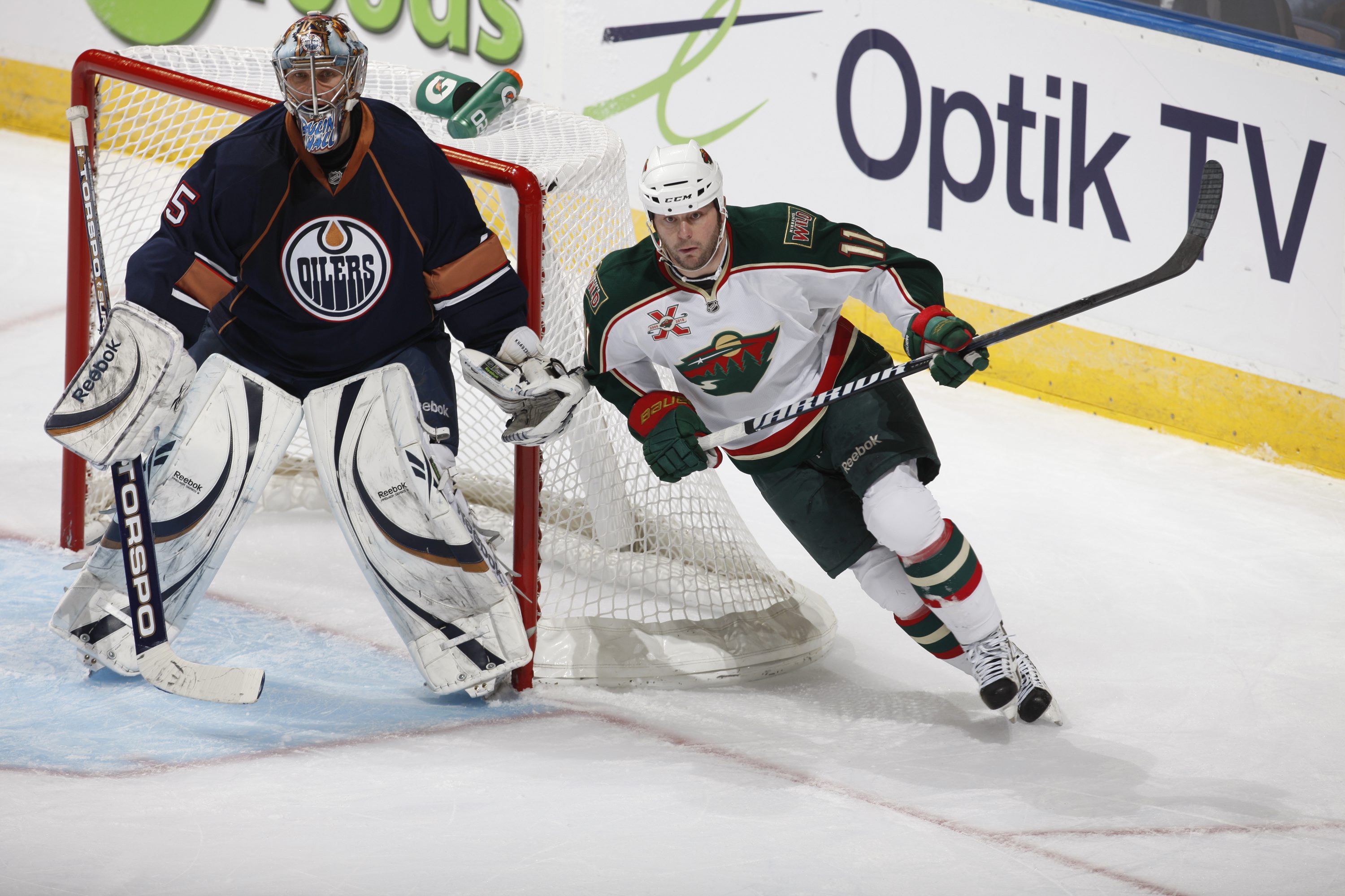 EDMONTON, CANADA - JANUARY 18: John Madden #11 of the Minnesota Wild skates against the Edmonton Oilers on January 18, 2011 at Rexall Place in Edmonton, Alberta, Canada. (Photo by Dale MacMillan/Getty Images)