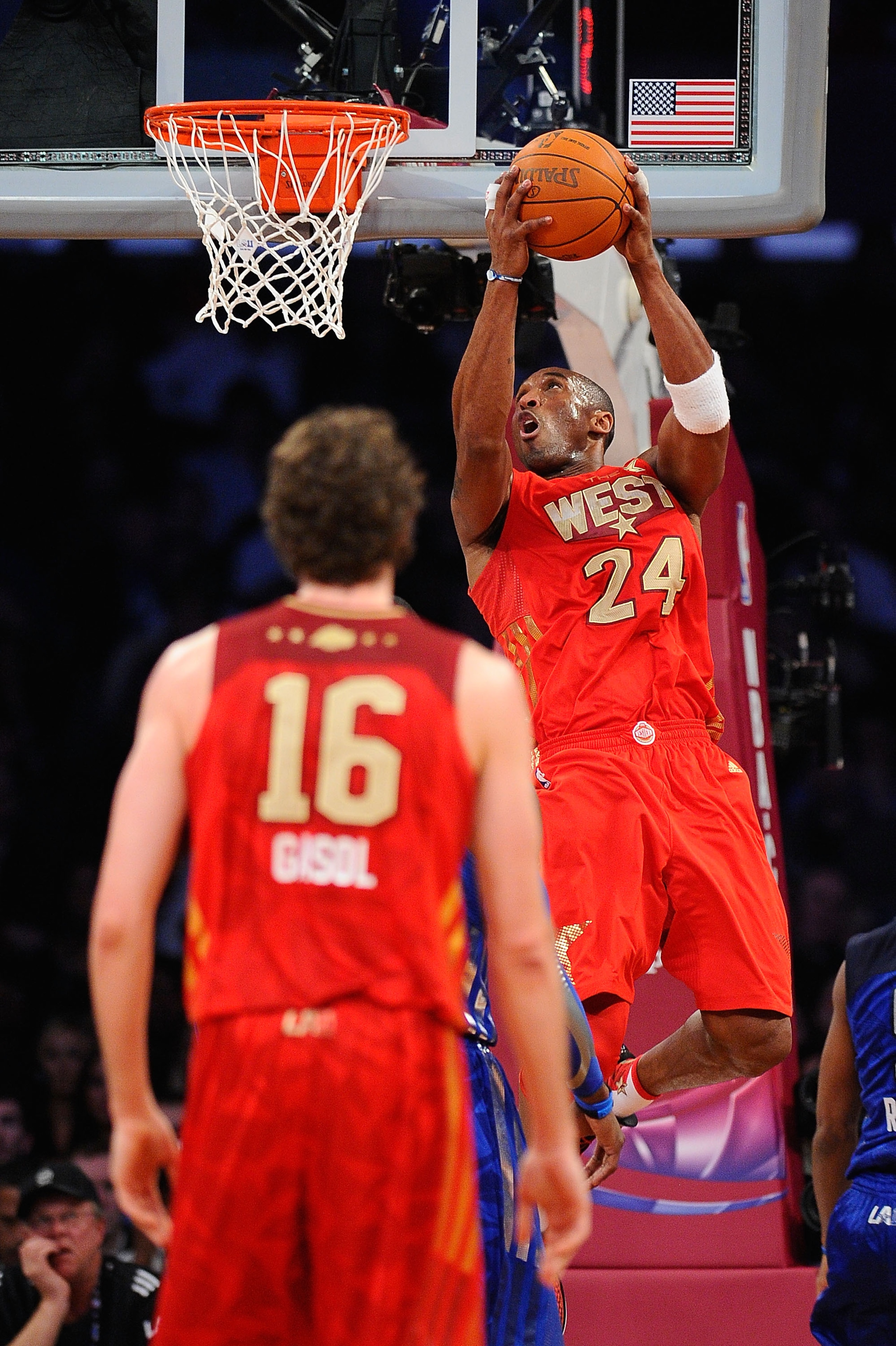 LOS ANGELES, CA - FEBRUARY 20:  Kobe Bryant #24 of the Los Angeles Lakers and the Western Conference goes up for a dunk as teammate Pau Gasol #16 looks on in the first half of the 2011 NBA All-Star Game at Staples Center on February 20, 2011 in Los Angele