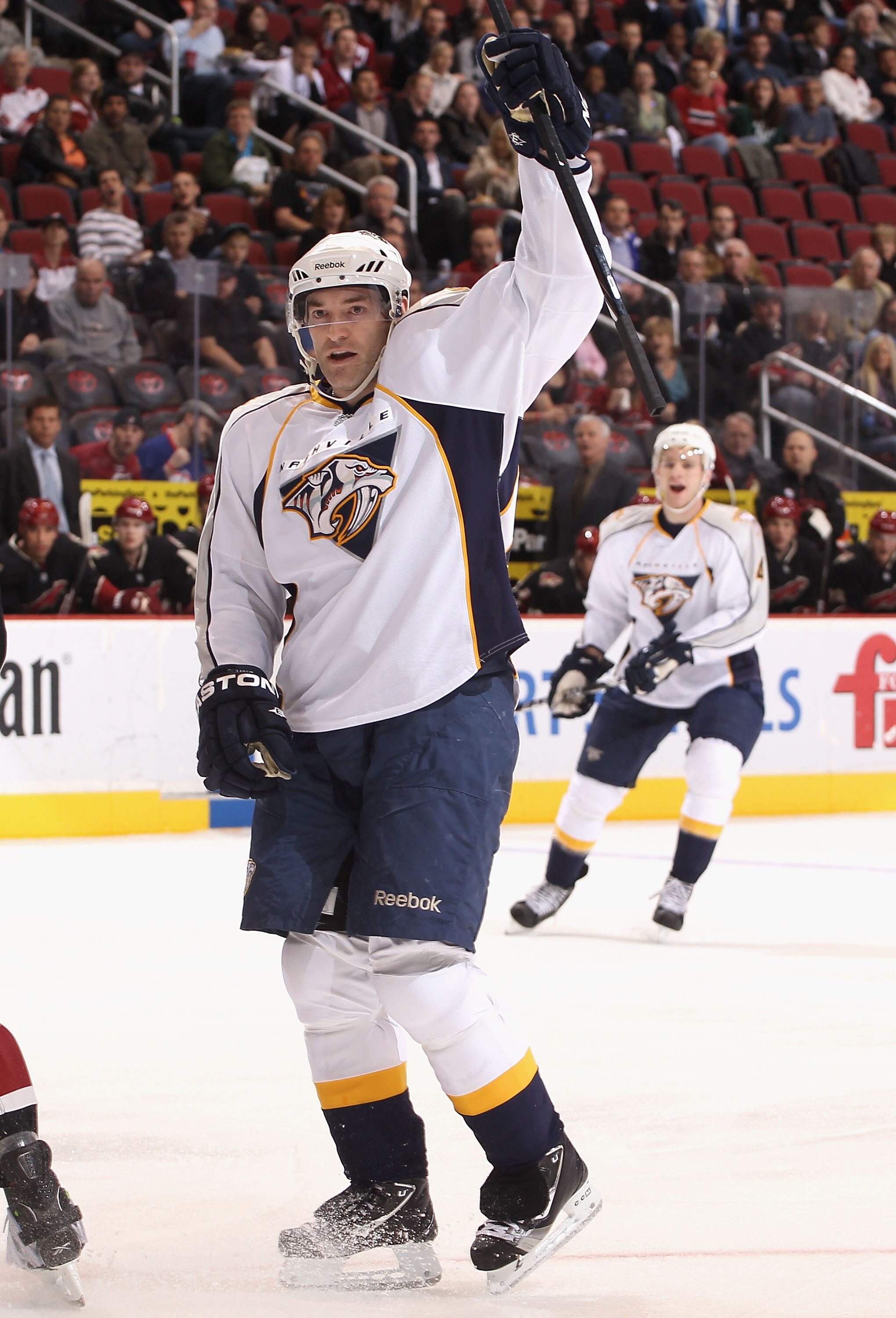GLENDALE, AZ - JANUARY 18:  J.P. Dumont #71 of the Nashville Predators celebrates after scoring a first period goal against the Phoenix Coyotes during the NHL game at Jobing.com Arena on January 18, 2011 in Glendale, Arizona.  (Photo by Christian Petersen