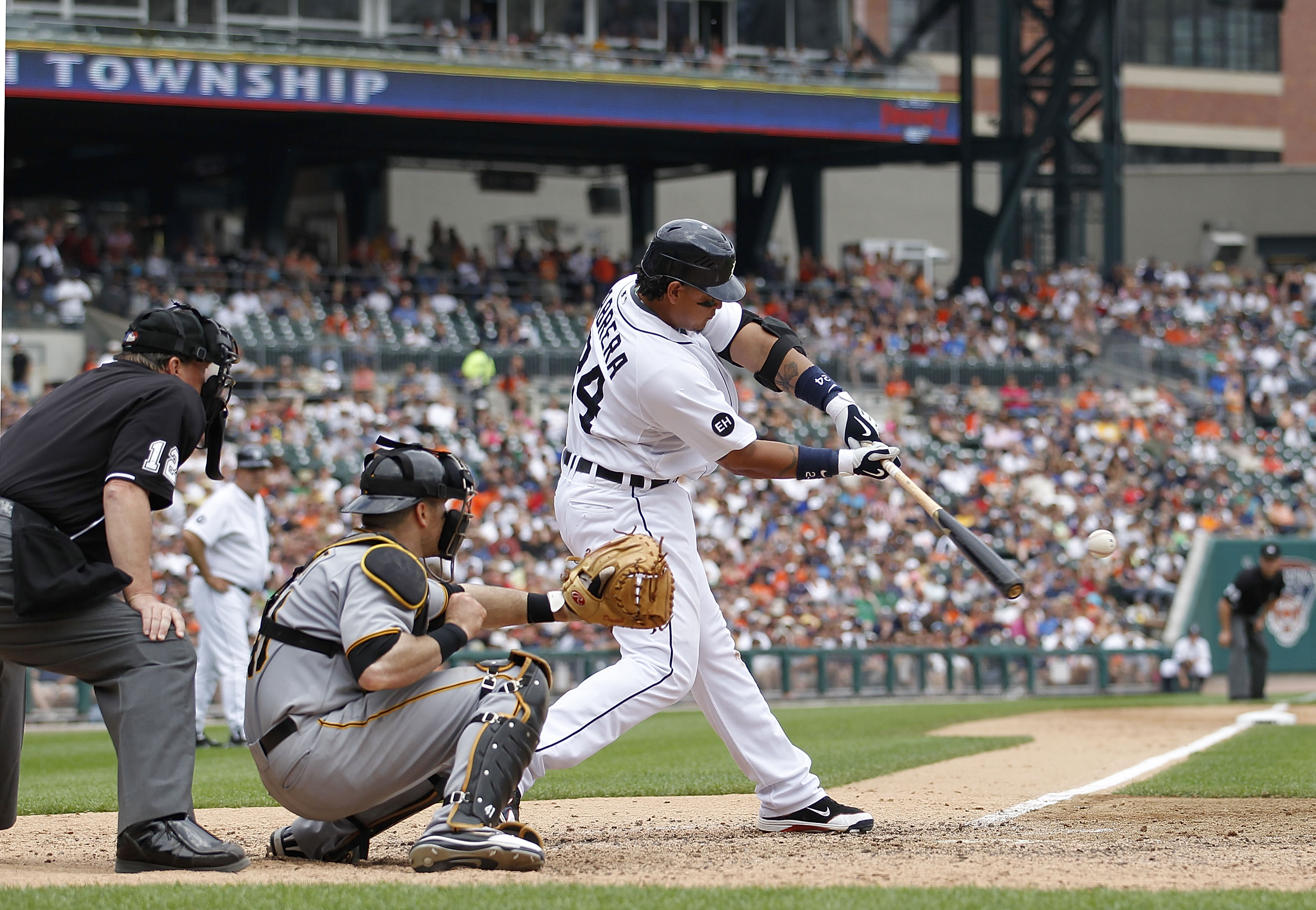DETROIT - JUNE 13: Miguel Cabrera #24 of the Detroit Tigers hits an eight inning two run game winning home run off Octavio Dotel #29 of the Pittsburgh Pirates during the game on June 13, 2010 at Comerica Park in Detroit, Michigan. The Tigers defeated the