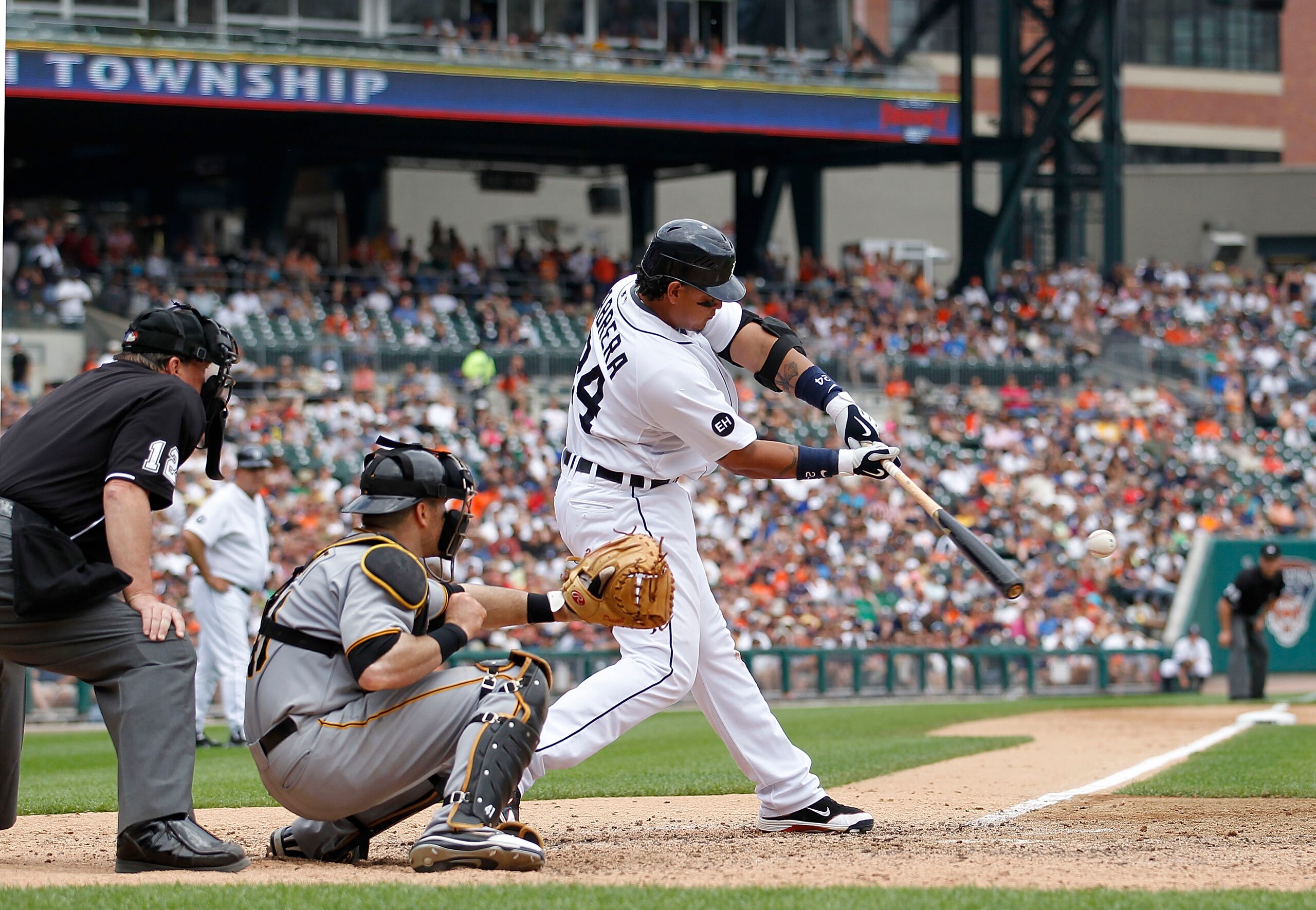 DETROIT - JUNE 13: Miguel Cabrera #24 of the Detroit Tigers hits an eight inning two run game winning home run off Octavio Dotel #29 of the Pittsburgh Pirates during the game on June 13, 2010 at Comerica Park in Detroit, Michigan. The Tigers defeated the DETROIT - JUNE 13: Miguel Cabrera #24 of the Detroit Tigers hits an eight inning two run game winning home run off Octavio Dotel #29 of the Pittsburgh Pirates during the game on June 13, 2010 at Comerica Park in Detroit, Michigan. The Tigers defeated the