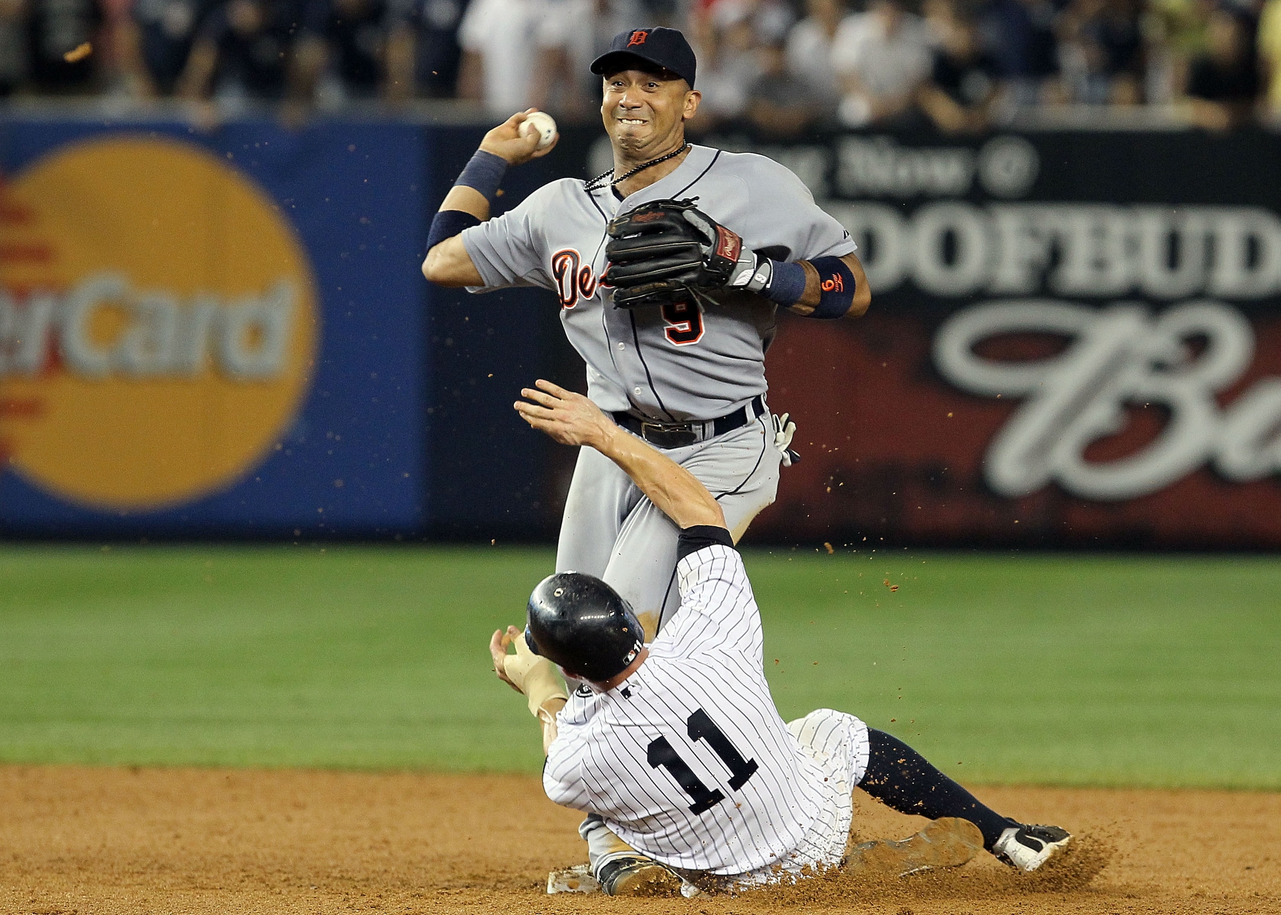 NEW YORK - AUGUST 16: Carlos Guillen #9 of the Detroit Tigers completes a game ending double play after forcing out Brett Gardner #11 of the New York Yankees on August 16, 2010 at Yankee Stadium in the Bronx borough of New York City. The Tigers defeated NEW YORK - AUGUST 16: Carlos Guillen #9 of the Detroit Tigers completes a game ending double play after forcing out Brett Gardner #11 of the New York Yankees on August 16, 2010 at Yankee Stadium in the Bronx borough of New York City. The Tigers defeated