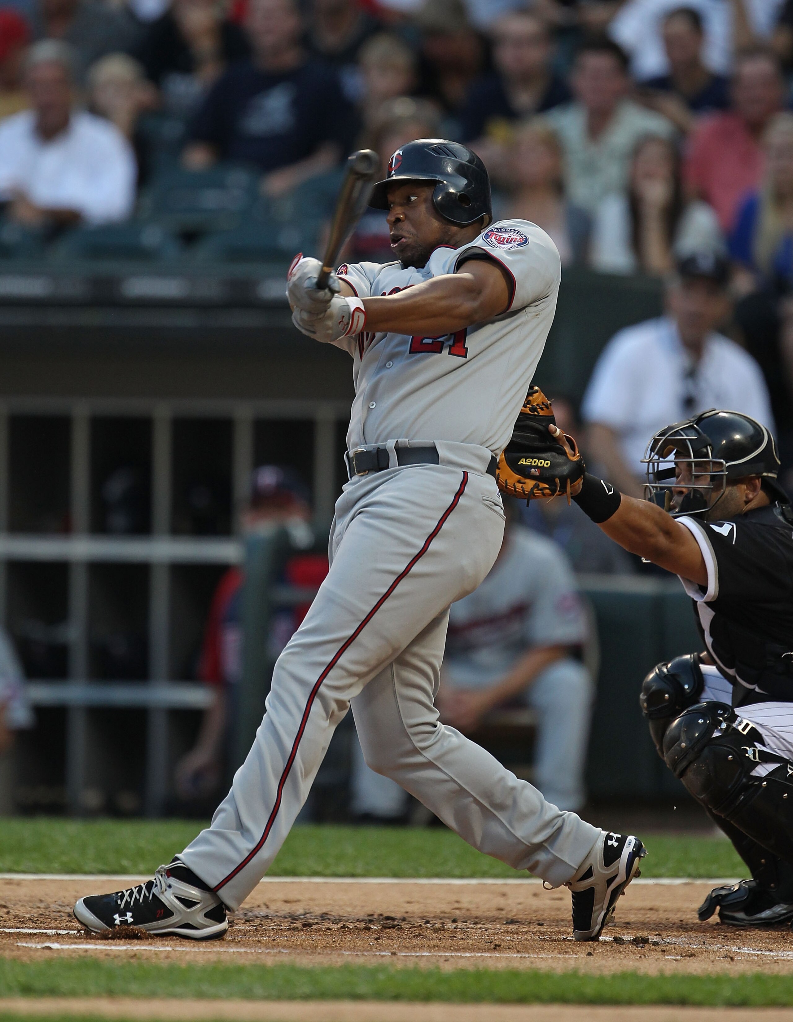 CHICAGO - AUGUST 10: Delmon Young #21 of the Minnesota Twins takes a swing against the Chicago White Sox at U.S. Cellular Field on August 10, 2010 in Chicago, Illinois. The Twins defeated the White Sox 12-6. (Photo by Jonathan Daniel/Getty Images) CHICAGO - AUGUST 10: Delmon Young #21 of the Minnesota Twins takes a swing against the Chicago White Sox at U.S. Cellular Field on August 10, 2010 in Chicago, Illinois. The Twins defeated the White Sox 12-6. (Photo by Jonathan Daniel/Getty Images)
