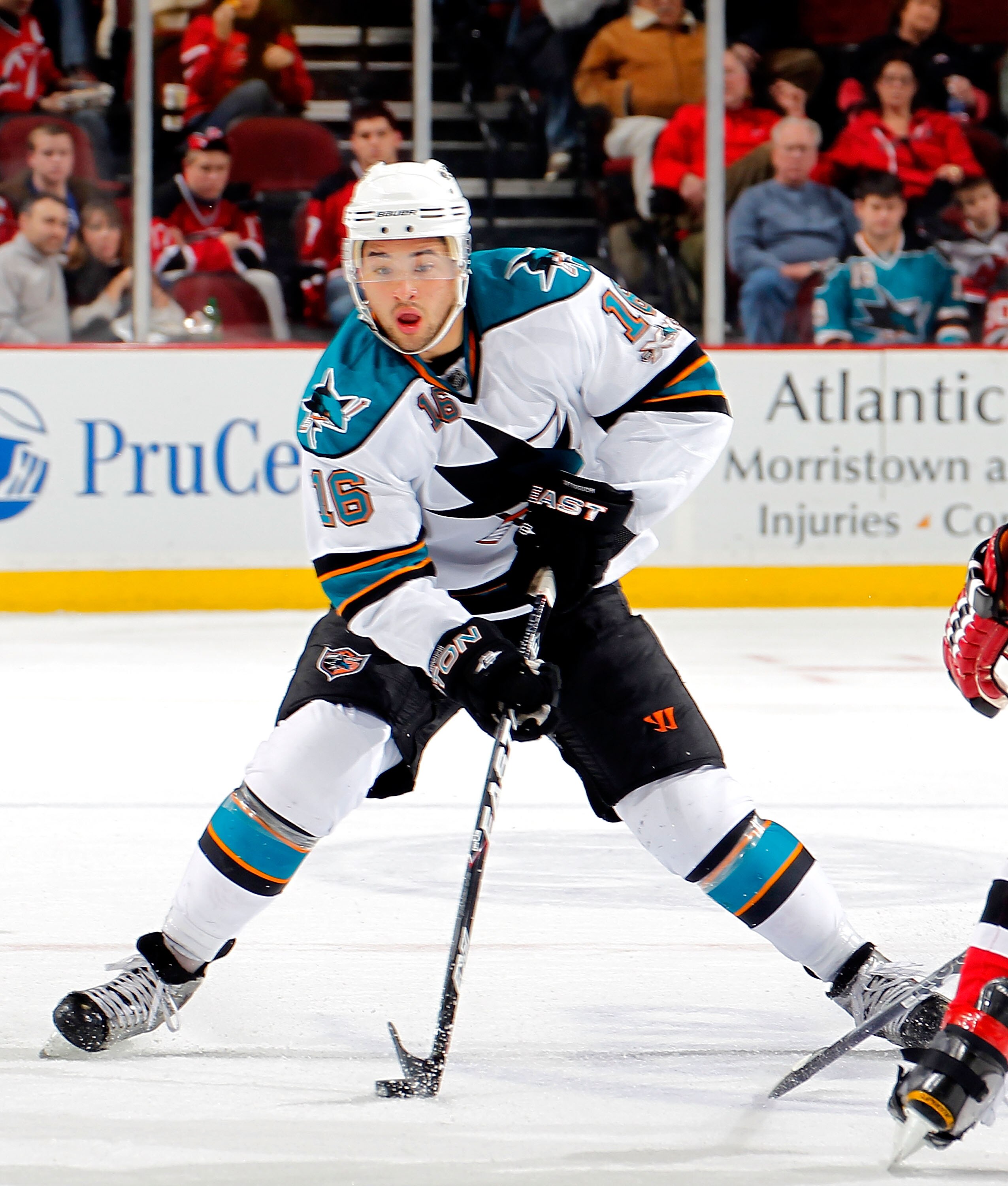 NEWARK, NJ - FEBRUARY 11: Devin Setoguchi #16 of the San Jose Sharks skates during an NHL hockey game against the New Jersey Devils on February 11, 2011 at the Prudential Center in Newark, New Jersey. (Photo by Paul Bereswill/Getty Images)