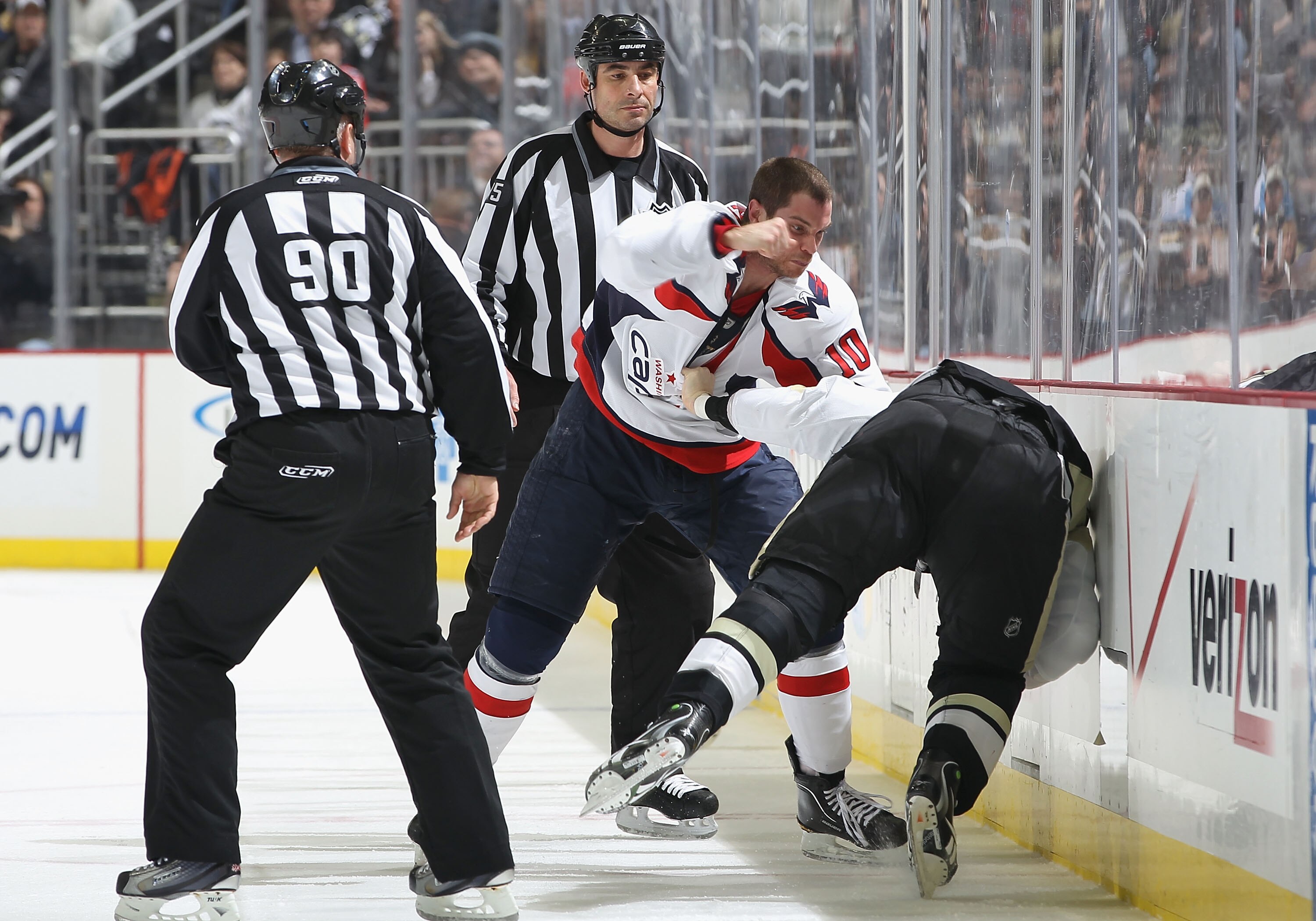 PITTSBURGH, PA - FEBRUARY 21:  Matt Bradley #10 of the Washington Capitals fights against the Pittsburgh Penguins during the NHL game at Consol Energy Center on February 21, 2011 in Pittsburgh, Pennsylvania. The Capitals defeated the Penguins 1-0.  (Photo