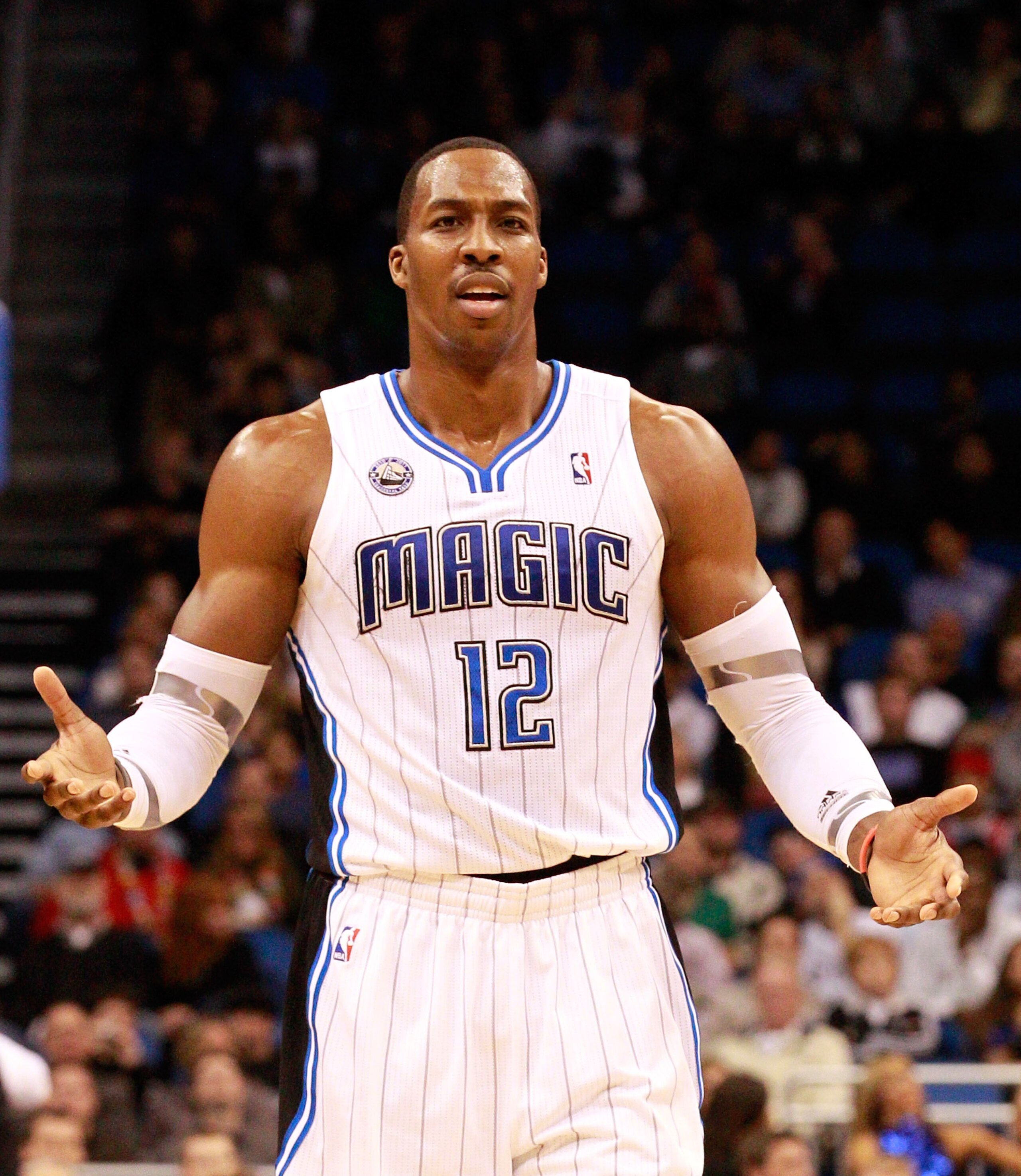 ORLANDO, FL - FEBRUARY 08: Dwight Howard #12 of the Orlando Magic reacts to a foul during the game against the Los Angeles Clippers at Amway Arena on February 8, 2011 in Orlando, Florida. NOTE TO USER: User expressly acknowledges and agrees that, by dow ORLANDO, FL - FEBRUARY 08: Dwight Howard #12 of the Orlando Magic reacts to a foul during the game against the Los Angeles Clippers at Amway Arena on February 8, 2011 in Orlando, Florida. NOTE TO USER: User expressly acknowledges and agrees that, by dow