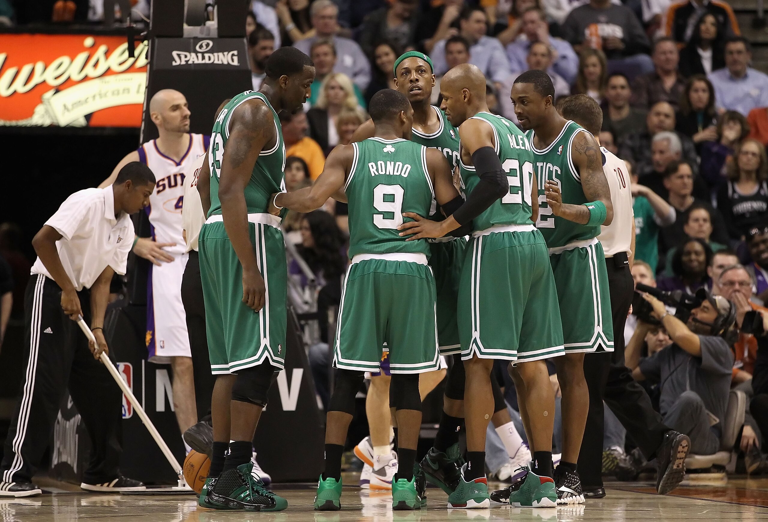 PHOENIX, AZ - JANUARY 28: Kendrick Perkins #43, Rajon Rondo #9, Paul Pierce #34, Ray Allen #20 and Von Wafer #12 of the Boston Celtics huddle up during the NBA game against the Phoenix Suns at US Airways Center on January 28, 2011 in Phoenix, Arizona. Th PHOENIX, AZ - JANUARY 28: Kendrick Perkins #43, Rajon Rondo #9, Paul Pierce #34, Ray Allen #20 and Von Wafer #12 of the Boston Celtics huddle up during the NBA game against the Phoenix Suns at US Airways Center on January 28, 2011 in Phoenix, Arizona. Th