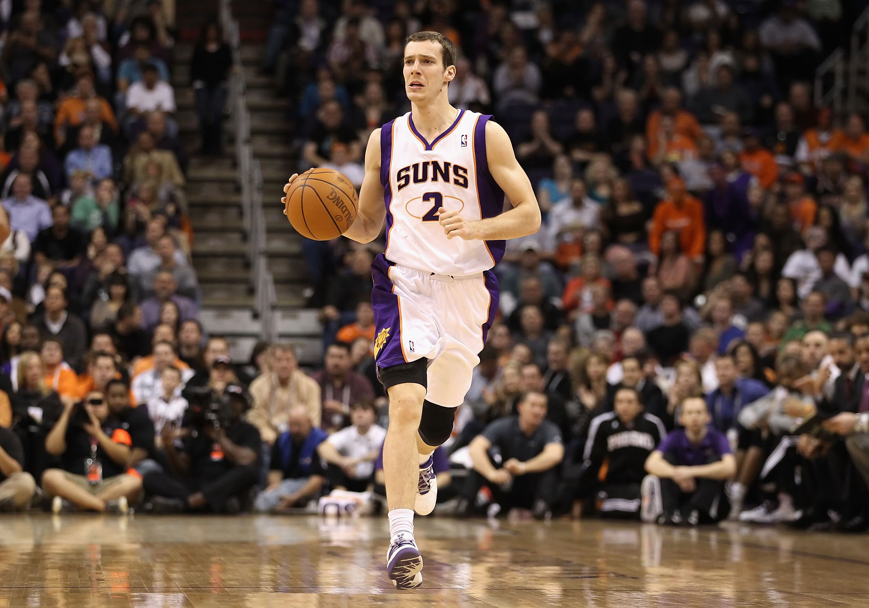 PHOENIX, AZ - JANUARY 14: Goran Dragic #2 of the Phoenix Suns hanldes the ball during the NBA game against the Portland Trail Blazers at US Airways Center on January 14, 2011 in Phoenix, Arizona. The Suns defeated the Trail Blazers 115-111. NOTE TO USER: PHOENIX, AZ - JANUARY 14: Goran Dragic #2 of the Phoenix Suns hanldes the ball during the NBA game against the Portland Trail Blazers at US Airways Center on January 14, 2011 in Phoenix, Arizona. The Suns defeated the Trail Blazers 115-111. NOTE TO USER: