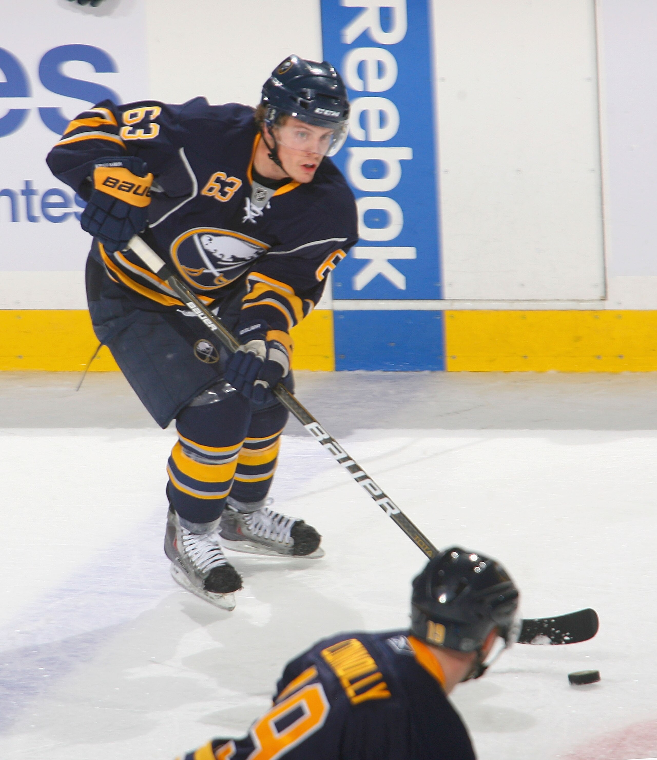 BUFFALO, NY - FEBRUARY 16: Tyler Ennis #63 of the Buffalo Sabres makes a pass to Tim Connolly #19 against the Toronto Maple Leafs at HSBC Arena on February 16, 2011 in Buffalo, New York.  (Photo by Rick Stewart/Getty Images)
