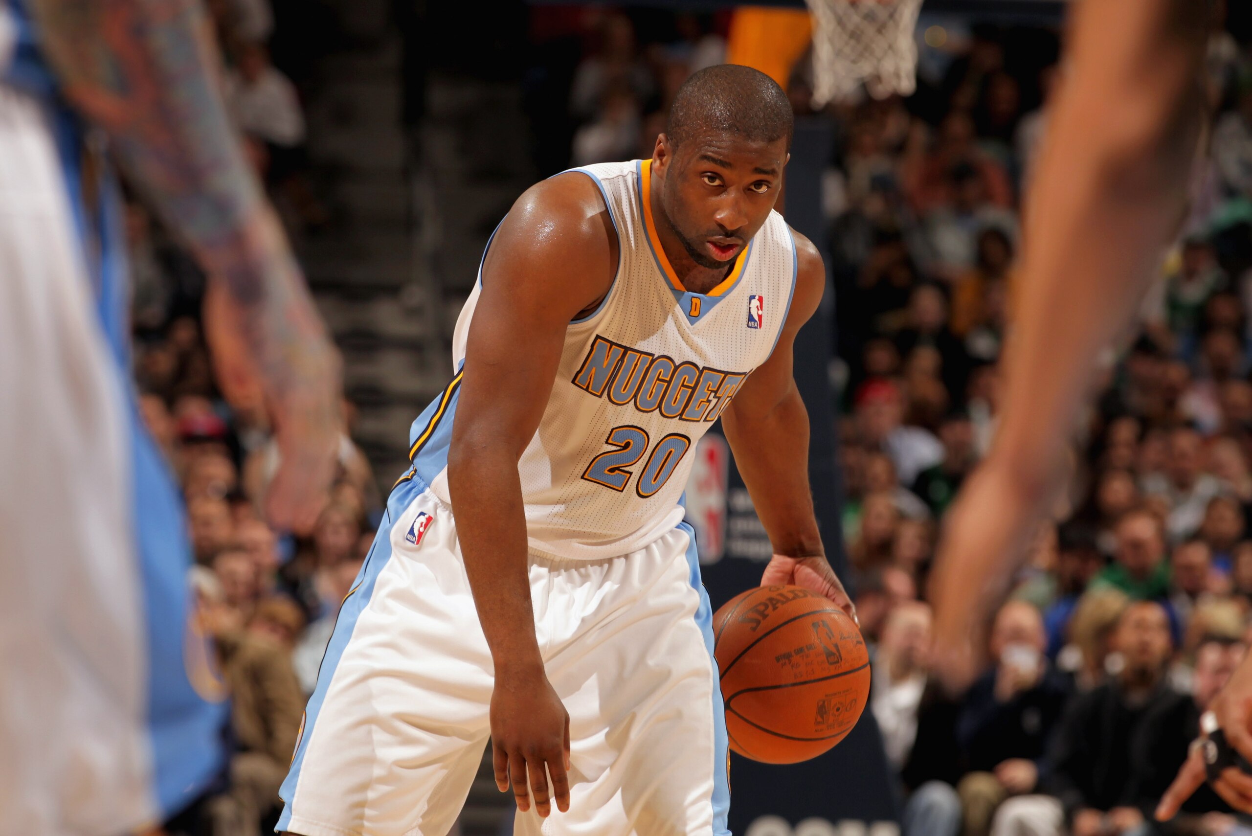 DENVER, CO - FEBRUARY 24: Raymond Felton #20 of the Denver Nuggets controls the ball against the Boston Celtics during NBA action at the Pepsi Center on February 24, 2011 in Denver, Colorado. The Nuggets defeated the Celtics 89-75. NOTE TO USER: User exp DENVER, CO - FEBRUARY 24: Raymond Felton #20 of the Denver Nuggets controls the ball against the Boston Celtics during NBA action at the Pepsi Center on February 24, 2011 in Denver, Colorado. The Nuggets defeated the Celtics 89-75. NOTE TO USER: User exp
