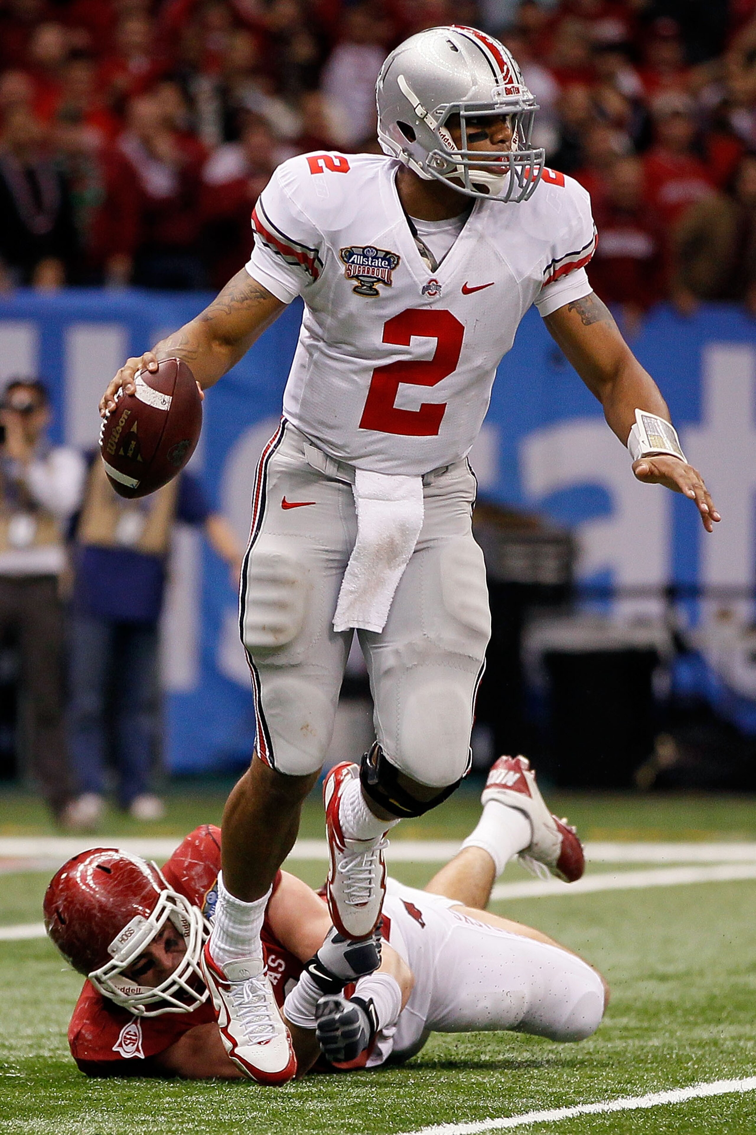 NEW ORLEANS, LA - JANUARY 04: Quarterback Terrelle Pryor #2 of the Ohio State Buckeyes looks to run against the Arkansas Razorbacks during the Allstate Sugar Bowl at the Louisiana Superdome on January 4, 2011 in New Orleans, Louisiana. (Photo by Kevin C NEW ORLEANS, LA - JANUARY 04: Quarterback Terrelle Pryor #2 of the Ohio State Buckeyes looks to run against the Arkansas Razorbacks during the Allstate Sugar Bowl at the Louisiana Superdome on January 4, 2011 in New Orleans, Louisiana. (Photo by Kevin C
