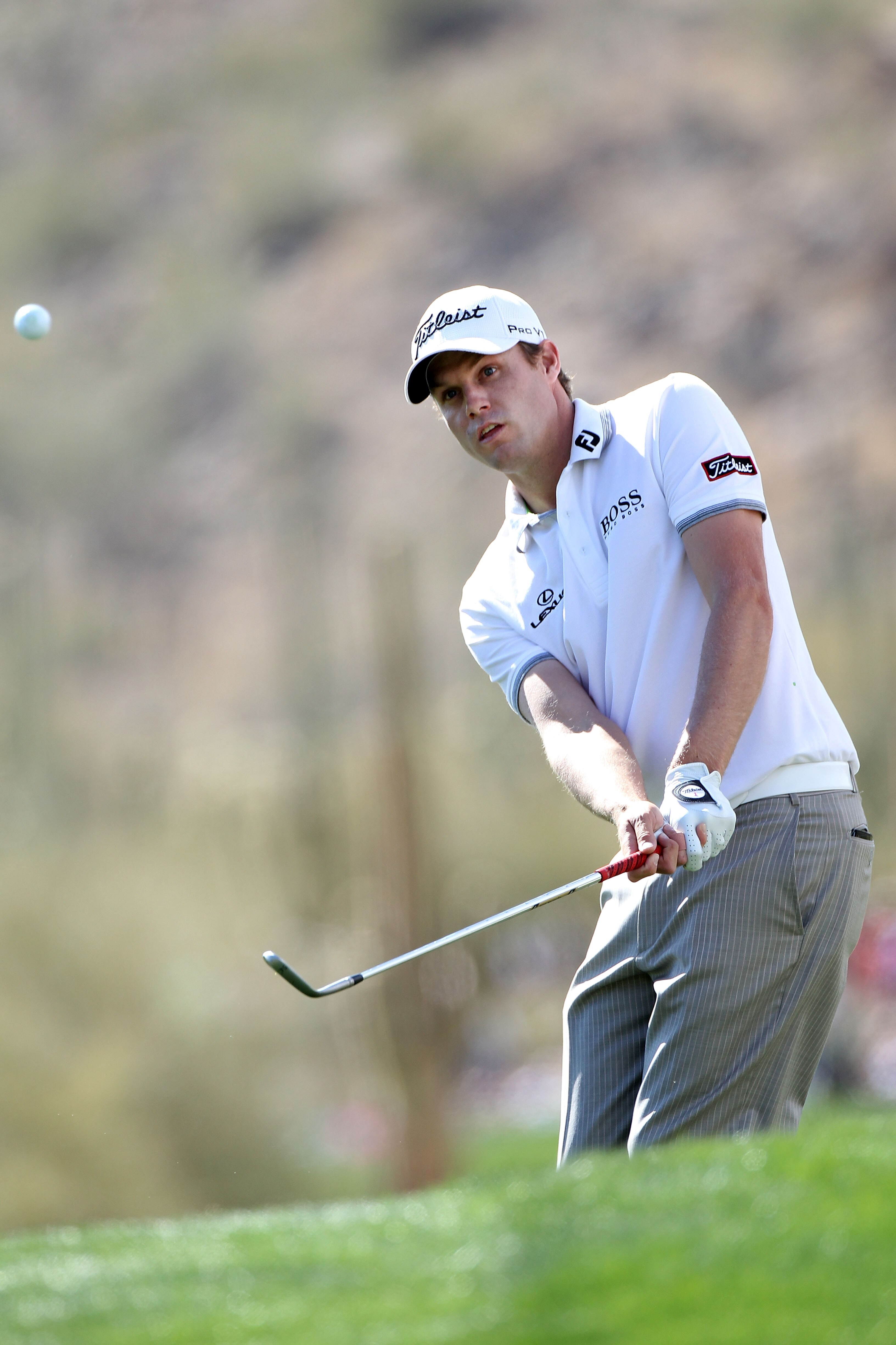 MARANA, AZ - FEBRUARY 25:  Nick Watney chips on the 15th hole during the third round of the Accenture Match Play Championship at the Ritz-Carlton Golf Club on February 25, 2011 in Marana, Arizona.  (Photo by Sam Greenwood/Getty Images)