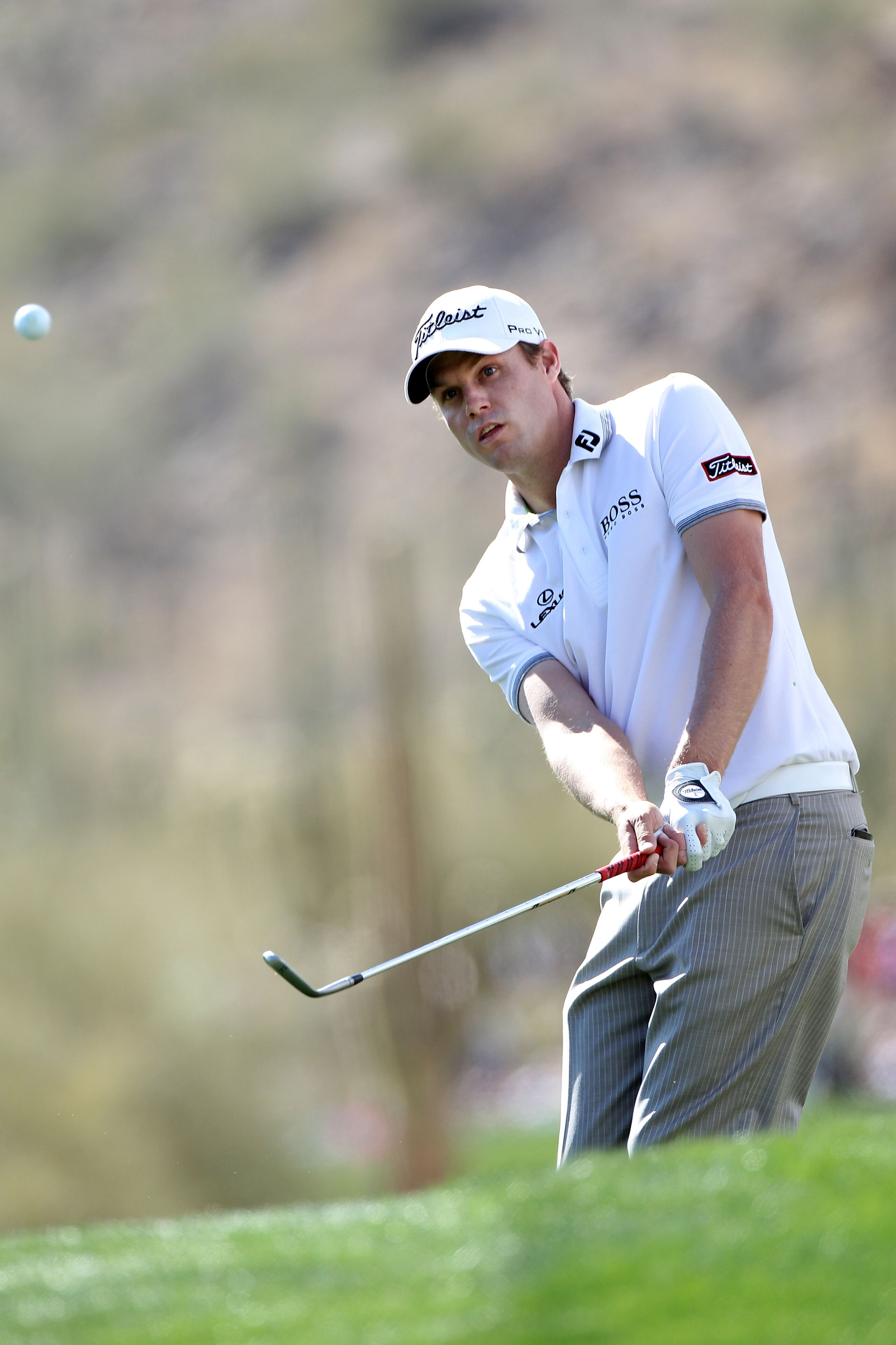 MARANA, AZ - FEBRUARY 25:  Nick Watney chips on the 15th hole during the third round of the Accenture Match Play Championship at the Ritz-Carlton Golf Club on February 25, 2011 in Marana, Arizona.  (Photo by Sam Greenwood/Getty Images)