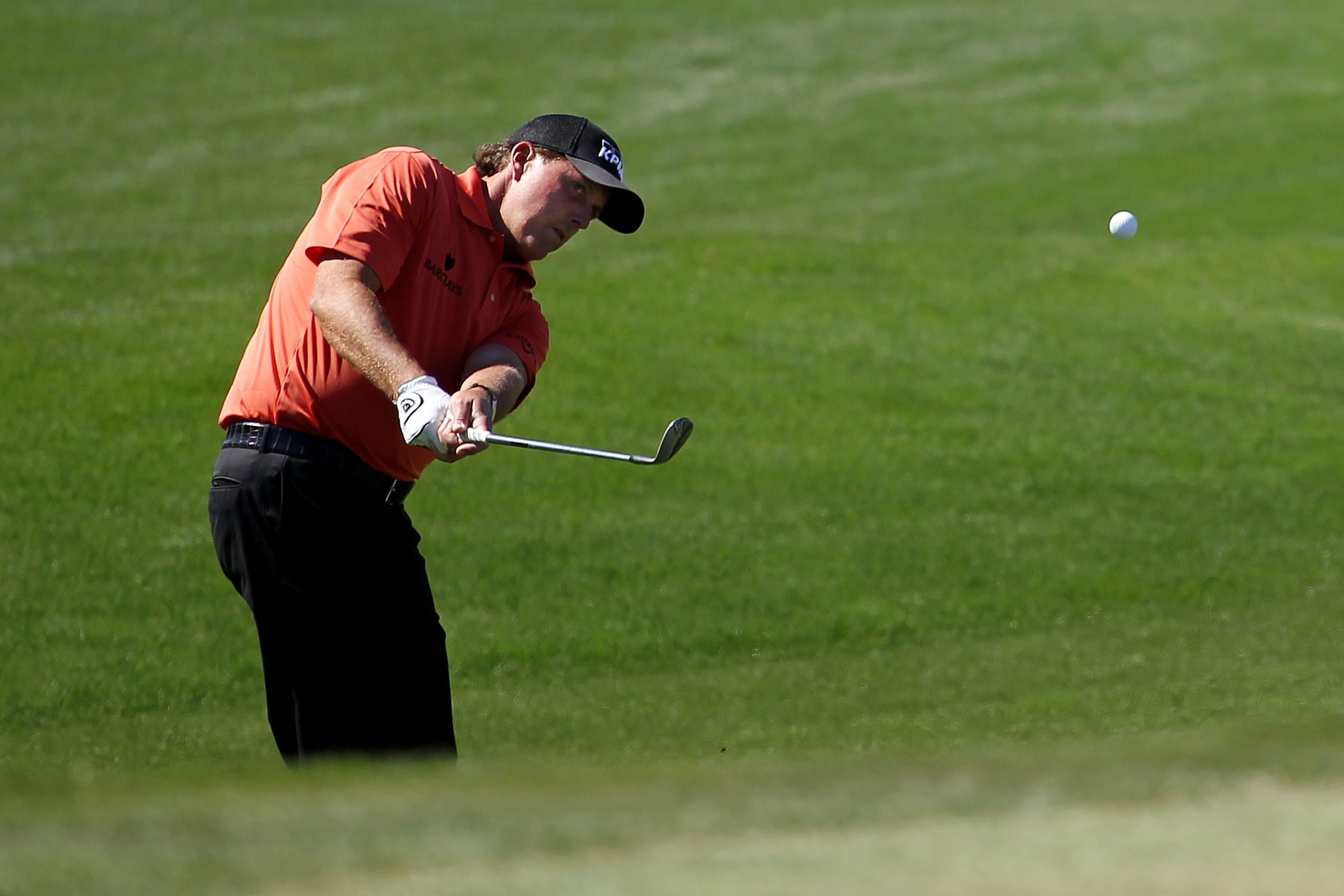 MARANA, AZ - FEBRUARY 24:  Phil Mickelson hits an approach shot on the 13th hole during the second round of the Accenture Match Play Championship at the Ritz-Carlton Golf Club on February 24, 2011 in Marana, Arizona.  (Photo by Andy Lyons/Getty Images)