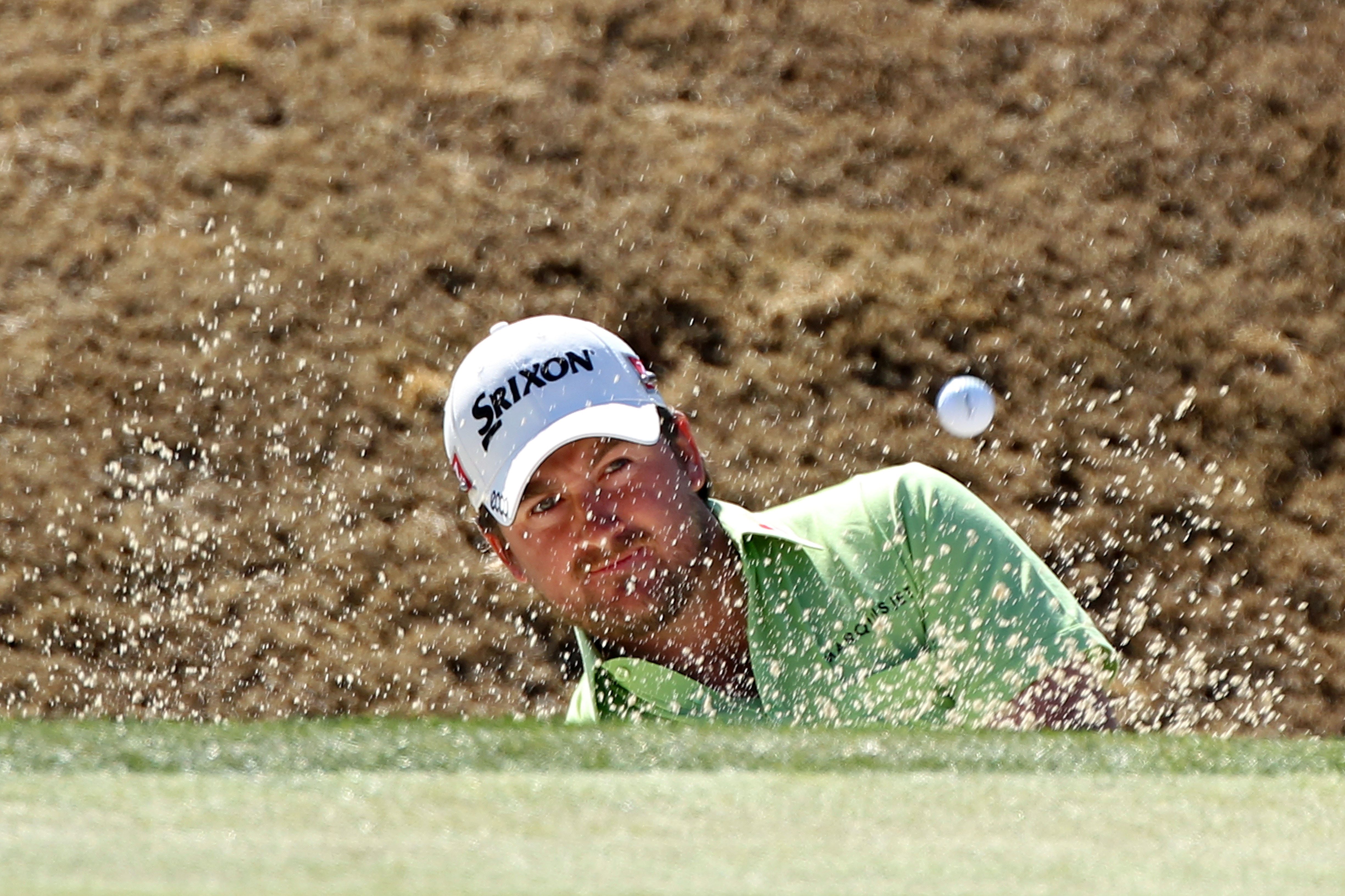MARANA, AZ - FEBRUARY 25:  Graeme McDowell of Northern Ireland hits from a bunker on the second hole during the third round of the Accenture Match Play Championship at the Ritz-Carlton Golf Club on February 25, 2011 in Marana, Arizona.  (Photo by Andy Lyo