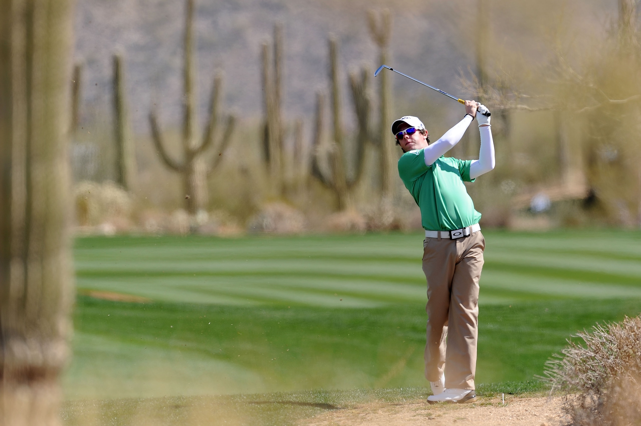 MARANA, AZ - FEBRUARY 24:  Rory McIlory of Northern Ireland hits an approach shot on the tenth hole during the second round of the Accenture Match Play Championship at the Ritz-Carlton Golf Club on February 24, 2011 in Marana, Arizona.  (Photo by Stuart F