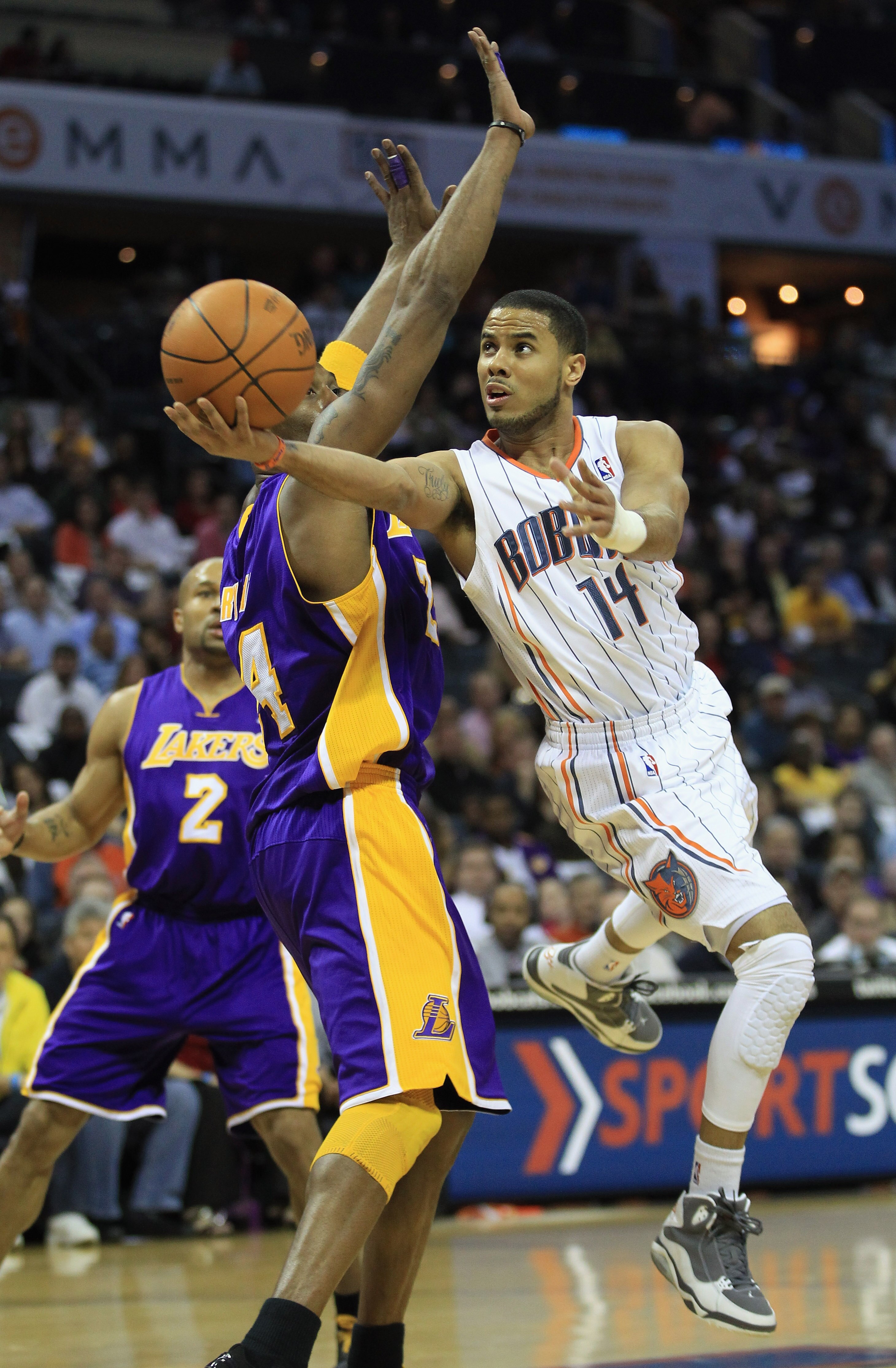 CHARLOTTE, NC - FEBRUARY 14:  D.J. Augustin #14 of the Charlotte Bobcats during their game at Time Warner Cable Arena on February 14, 2011 in Charlotte, North Carolina. NOTE TO USER: User expressly acknowledges and agrees that, by downloading and/or using