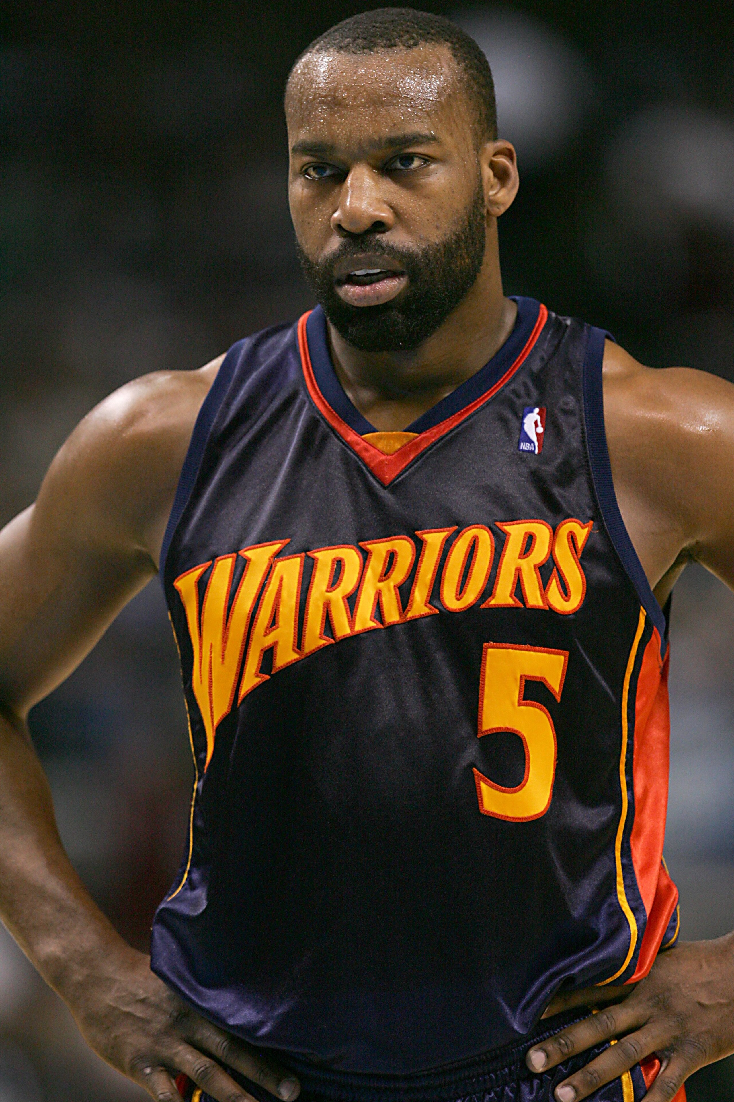 DALLAS - JANUARY 2: Baron Davis #5 of the Golden State Warriors looks on during the NBA game against the Dallas Mavericks at American Airlines Center on January 2, 2008 in Dallas, Texas. The Mavs won 121-99. NOTE TO USER: User expressly acknowledges an DALLAS - JANUARY 2: Baron Davis #5 of the Golden State Warriors looks on during the NBA game against the Dallas Mavericks at American Airlines Center on January 2, 2008 in Dallas, Texas. The Mavs won 121-99. NOTE TO USER: User expressly acknowledges an