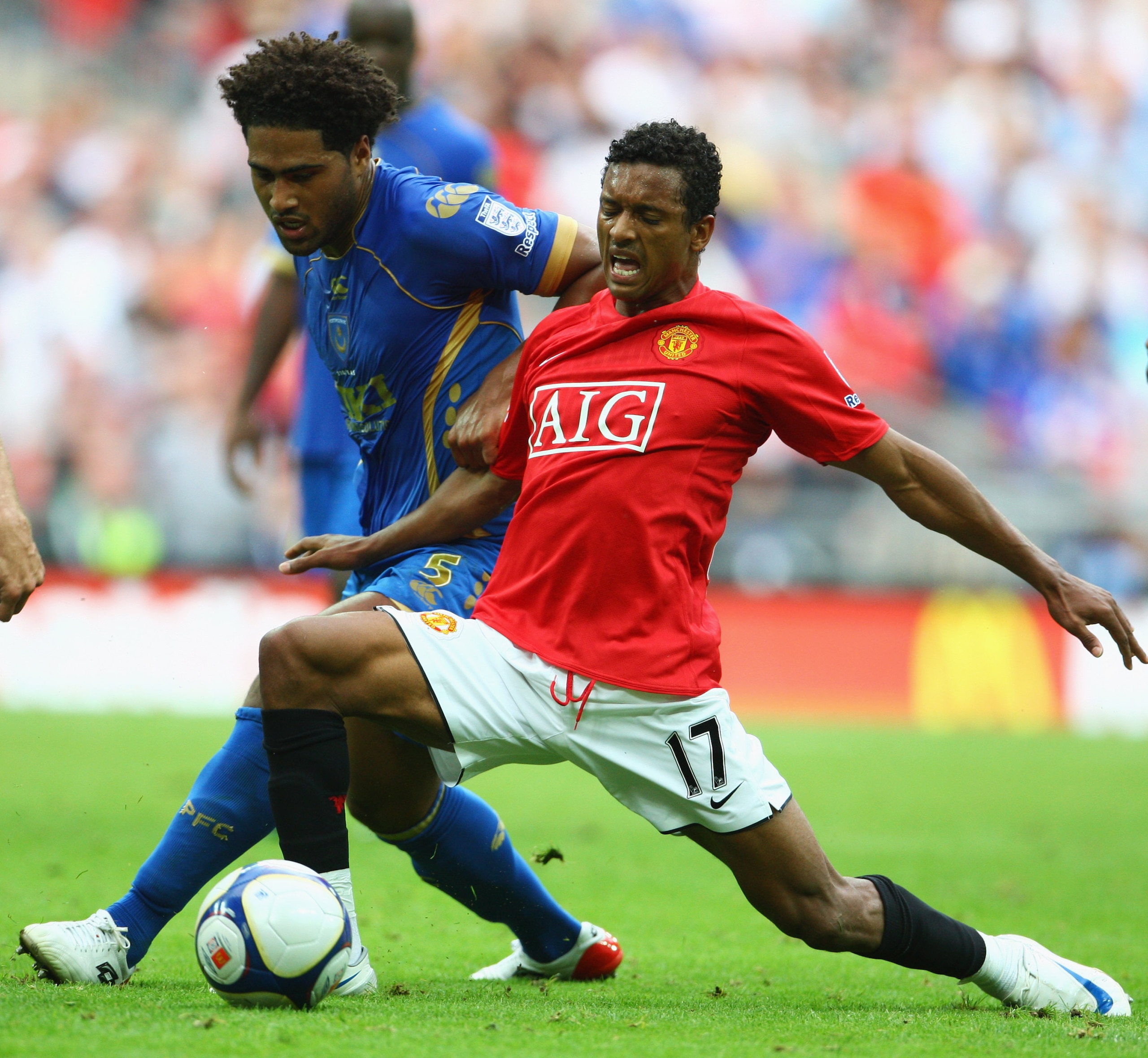 LONDON - AUGUST 10:  Luis Nani of Manchester United battles with Glen Johnson of Portsmouth during the FA Community Shield match between Manchester United and Portsmouth at Wembley Stadium on August 10, 2008 in London, England.  (Photo by Phil Cole/Getty