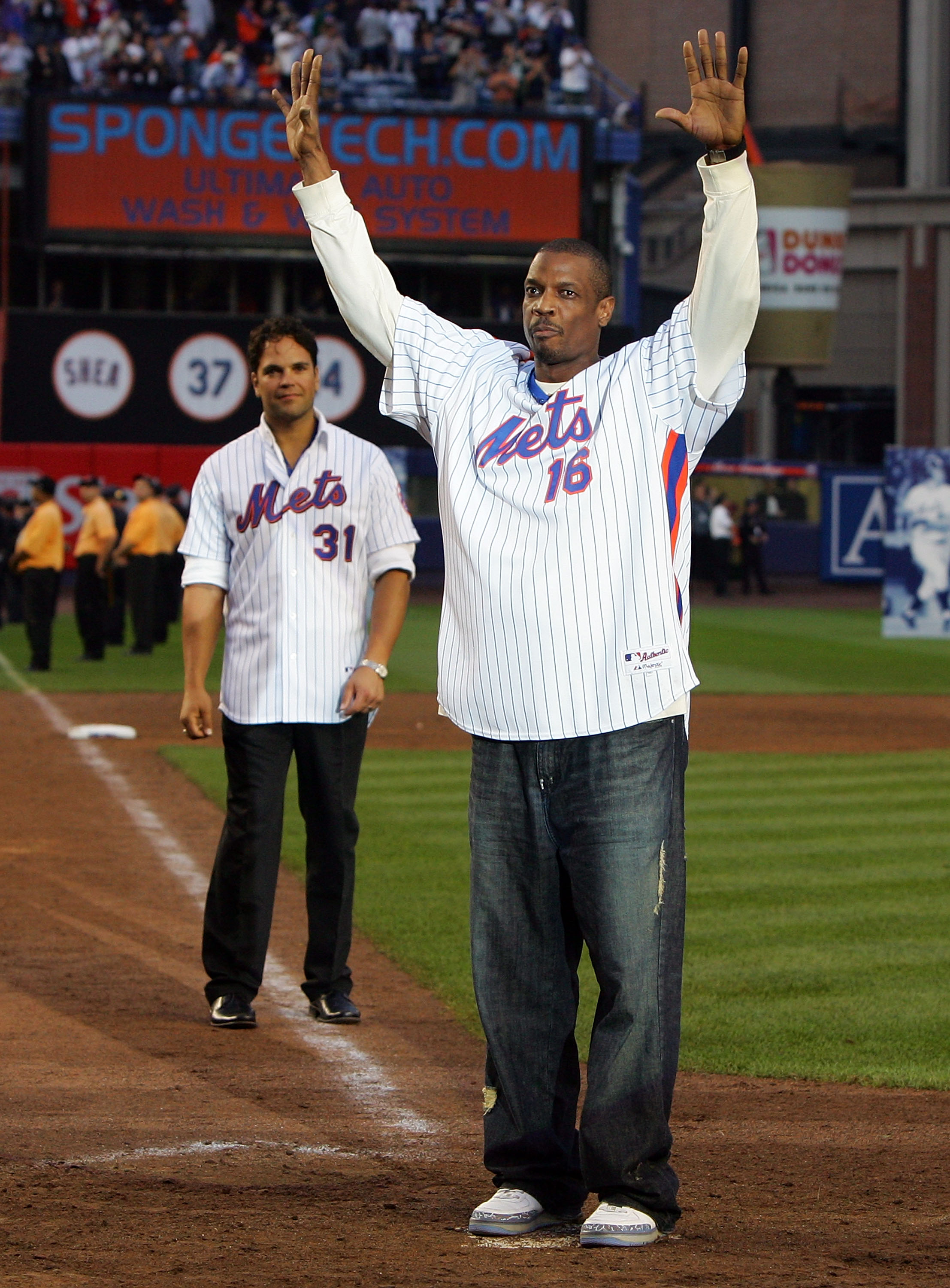 NEW YORK - SEPTEMBER 28: Former New York Met Dwight Gooden waves to the crowd during post game ceremoies after the Mets played the Florida Marlins in the last regular season baseball game ever played in Shea Stadium on September 28, 2008 in the Flushing n