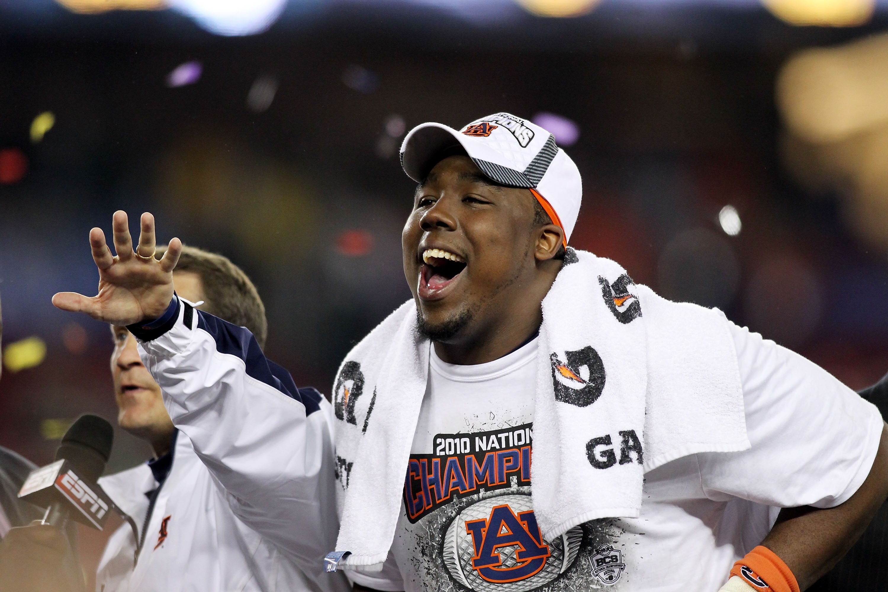 GLENDALE, AZ - JANUARY 10:  Nick Fairley #90 of the Auburn Tigers celebrates the Tigers 22-19 victory against the Oregon Ducks during the Tostitos BCS National Championship Game at University of Phoenix Stadium on January 10, 2011 in Glendale, Arizona.  (