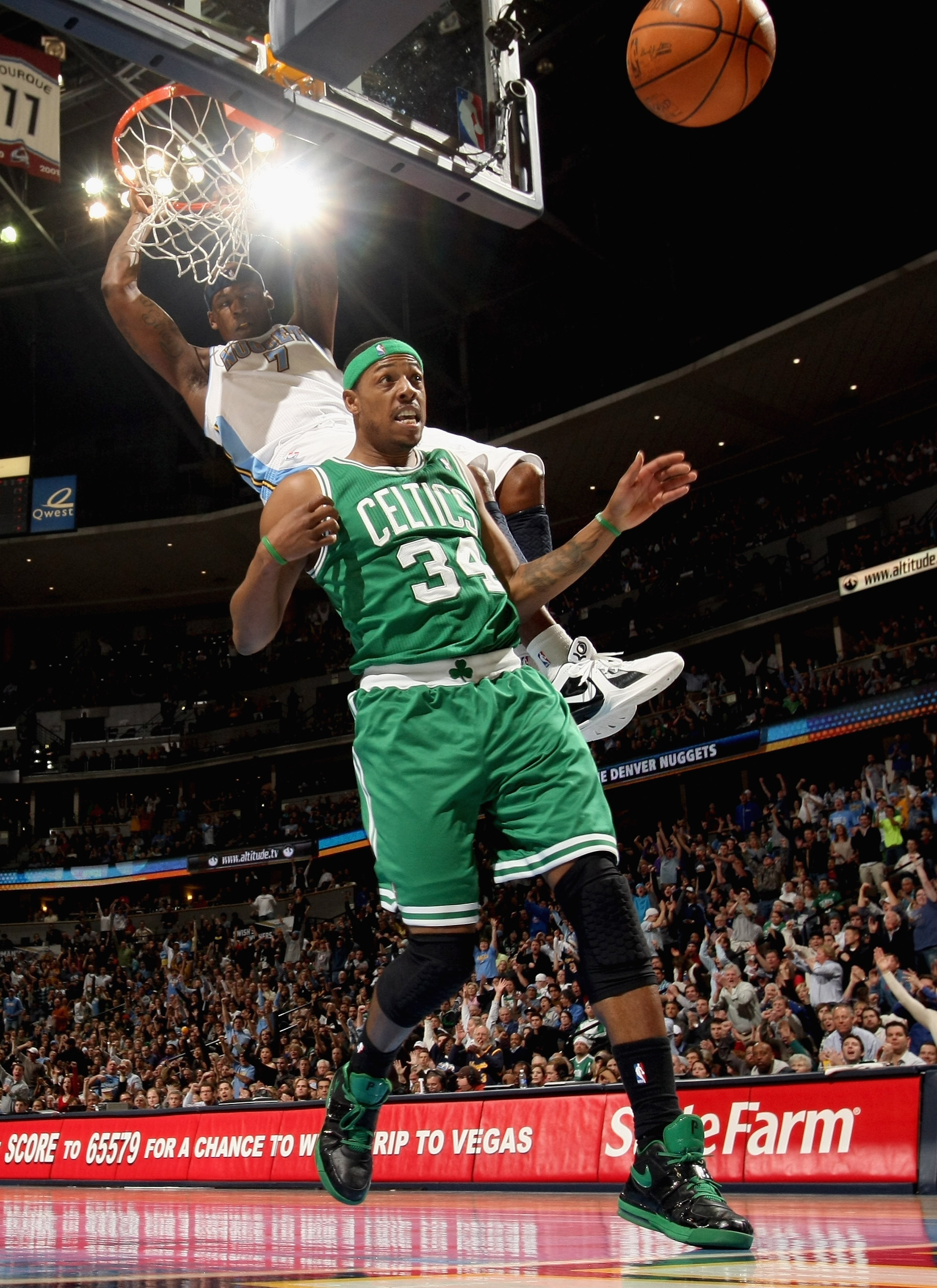 DENVER, CO - FEBRUARY 24:  Al Harrington #7 of the Denver Nuggets dunks the ball against Paul Pierce #34 of the Boston Celtics during NBA action at the Pepsi Center on February 24, 2011 in Denver, Colorado. The Nuggets defeated the Celtics 89-75. NOTE TO 