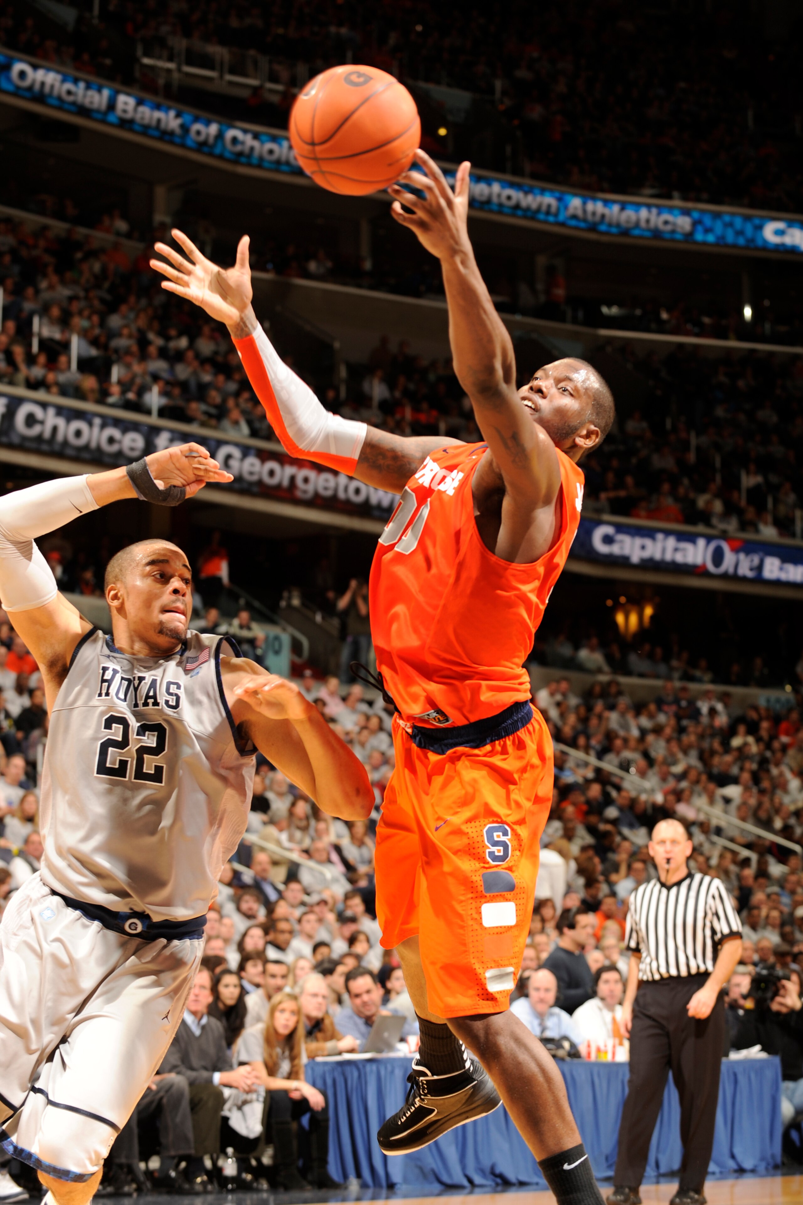 WASHINGTON, DC - FEBRUARY 26: Rick Jackson #00 of the Syracuse Orange goes after a loose ball against Julian Vaughn #22 of the Georgetown Hoyas on February 26, 2011 at the Verizon Center in Washington, DC The Orange 58-51. (Photo by Mitchell Layton/Get WASHINGTON, DC - FEBRUARY 26: Rick Jackson #00 of the Syracuse Orange goes after a loose ball against Julian Vaughn #22 of the Georgetown Hoyas on February 26, 2011 at the Verizon Center in Washington, DC The Orange 58-51. (Photo by Mitchell Layton/Get