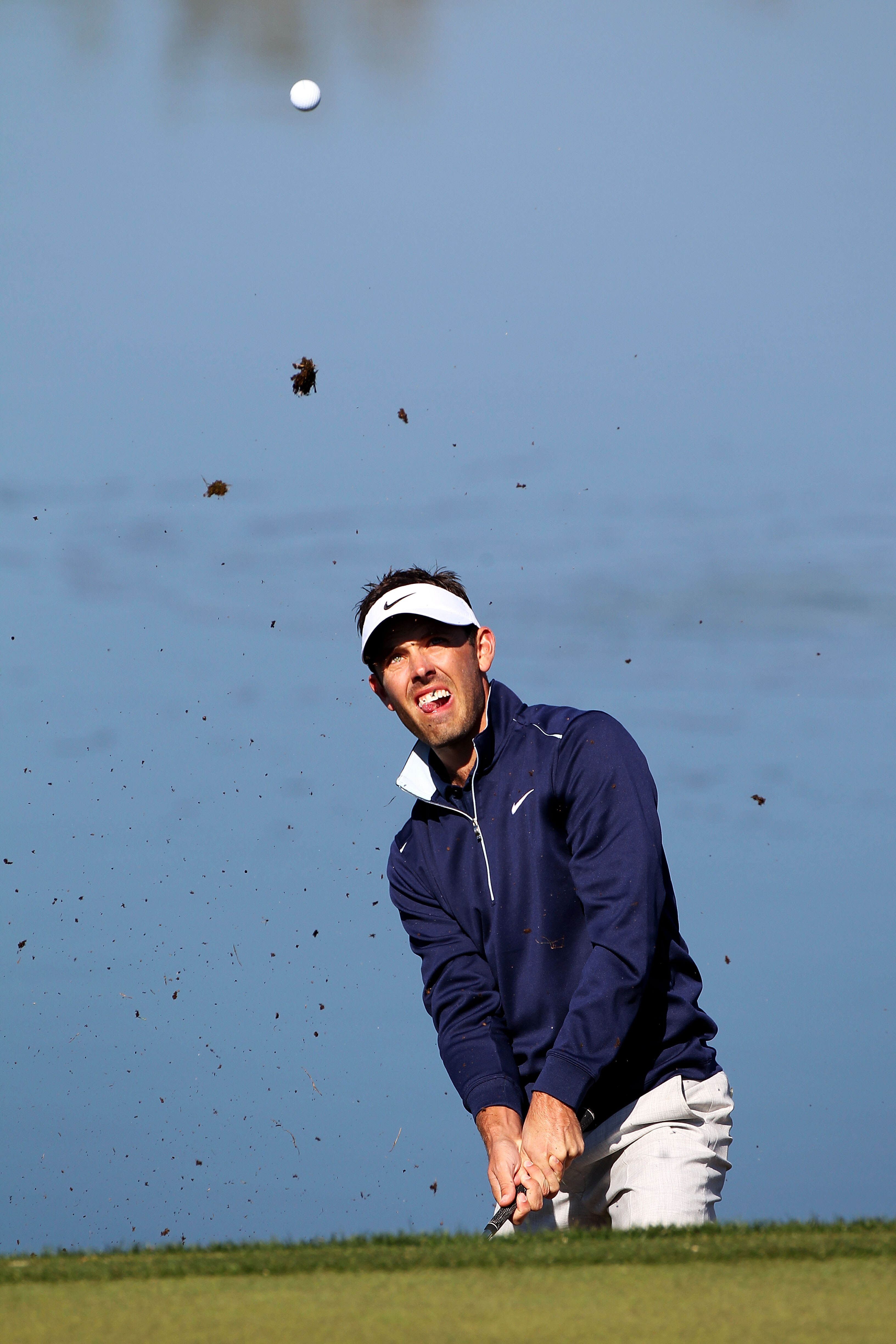 MARANA, AZ - FEBRUARY 24:  Charl Schwartzel of South Africa hits a shot on the green of the third hole during the second round of the Accenture Match Play Championship at the Ritz-Carlton Golf Club on February 24, 2011 in Marana, Arizona.  (Photo by Sam G