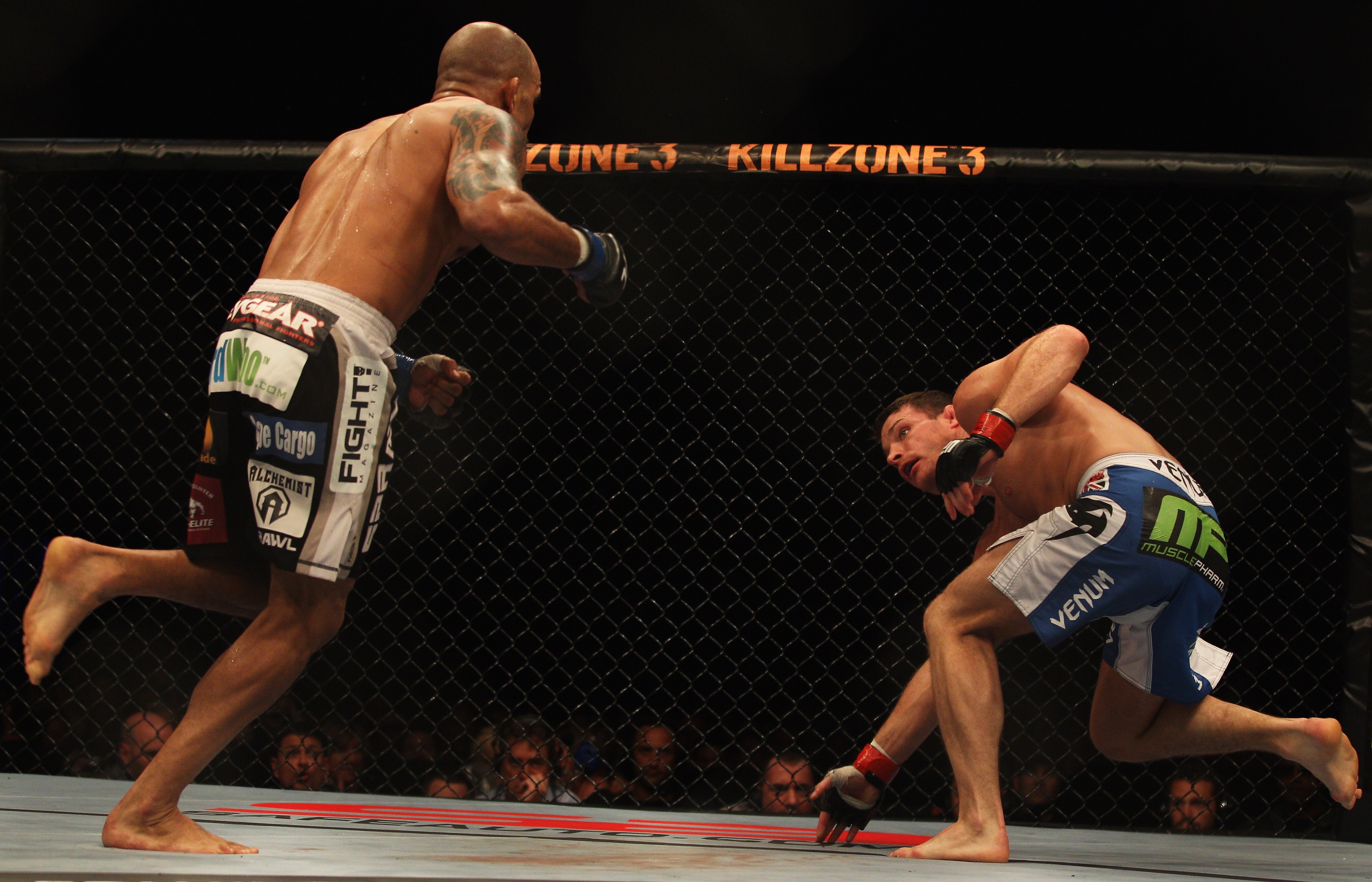 SYDNEY, AUSTRALIA - FEBRUARY 27:  Michael Bisping of Great Britain regains his feet after being knocked over by Jorge Rivera of the USA after winning their middleweight bout part of at UFC 127 at Acer Arena on February 27, 2011 in Sydney, Australia.  (Pho