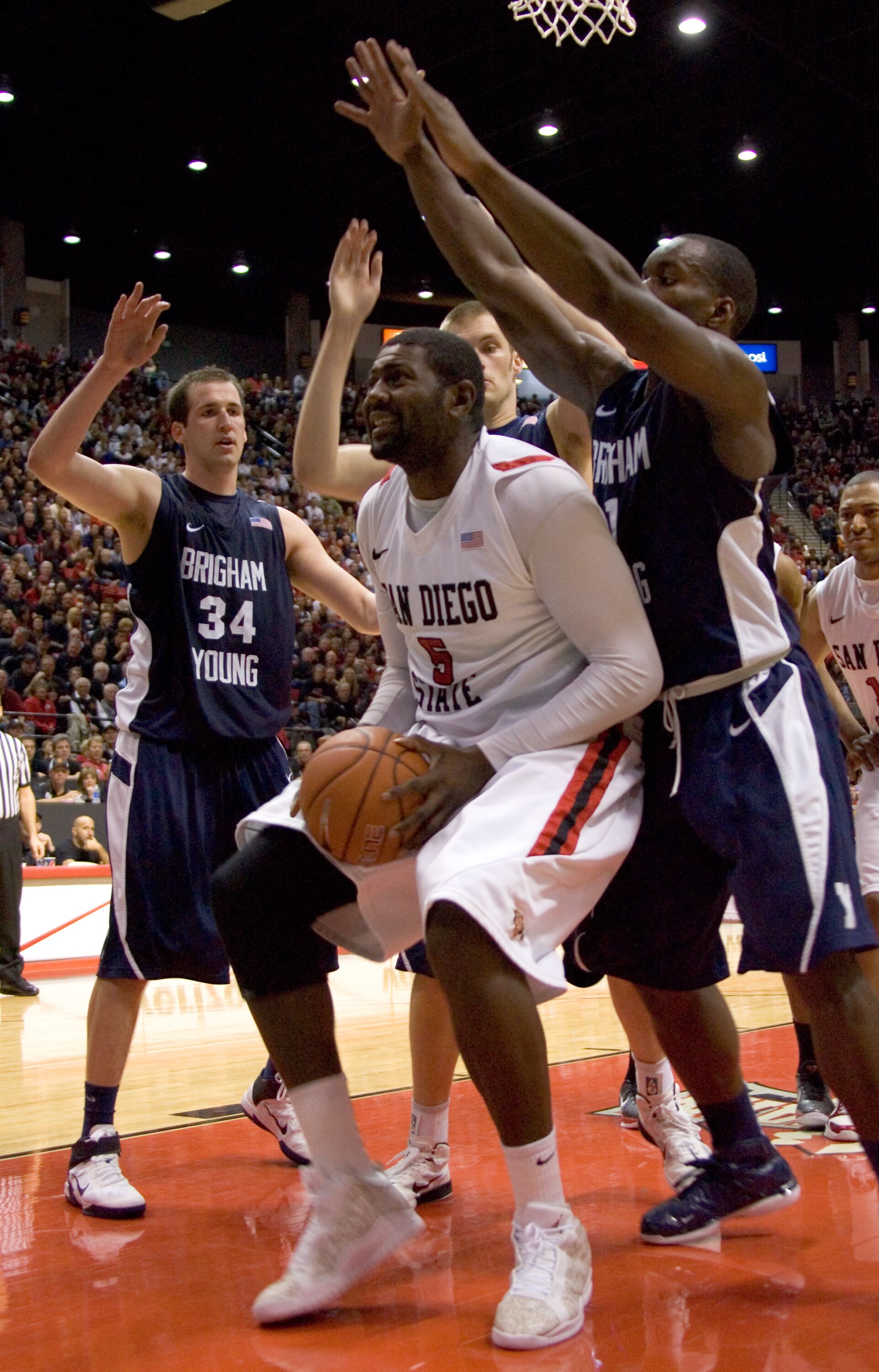 SAN DIEGO, CA - FEBRUARY 26:  Brian Carlwell #5 of the San Diego State Aztecs looks to shoot the ball against the Brigham Young Cougars during the second half at Cox Arena on February 26, 2011 in San Diego, California. BYU beat SDSU 80-67. (Photo by Kent