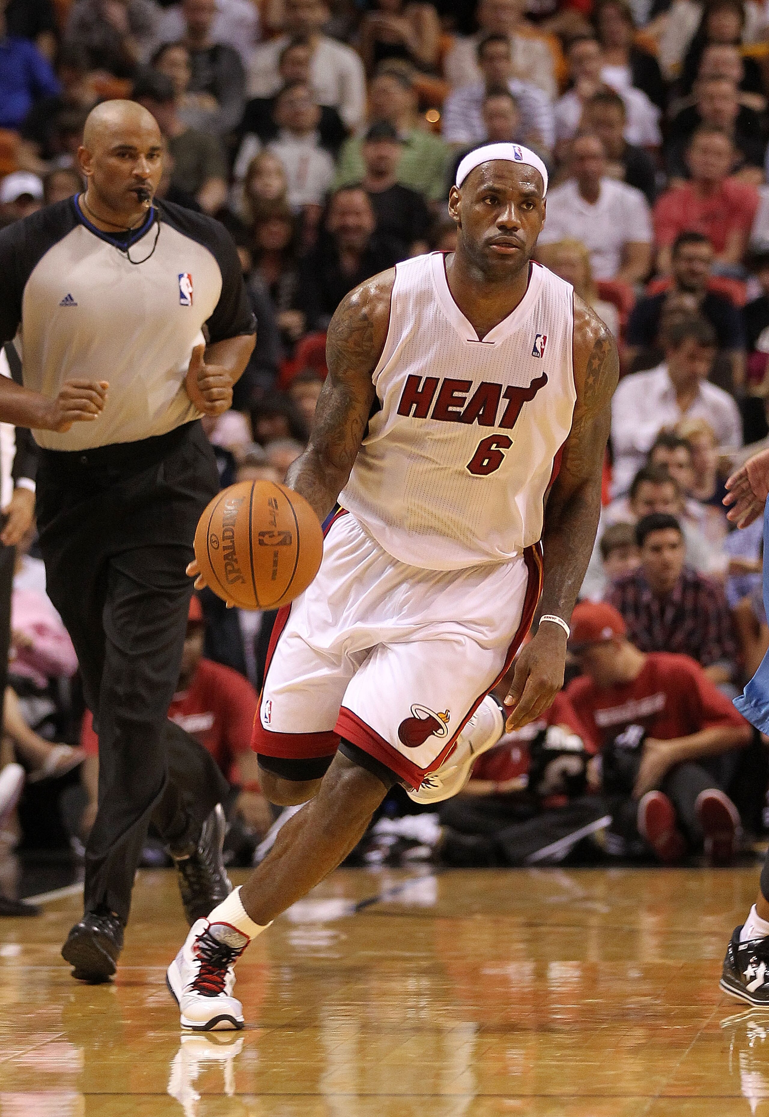 MIAMI, FL - FEBRUARY 25: LeBron James #6 of the Miami Heat brings the ball up the floor during a game against the Washington Wizards at American Airlines Arena on February 25, 2011 in Miami, Florida. NOTE TO USER: User expressly acknowledges and agrees th