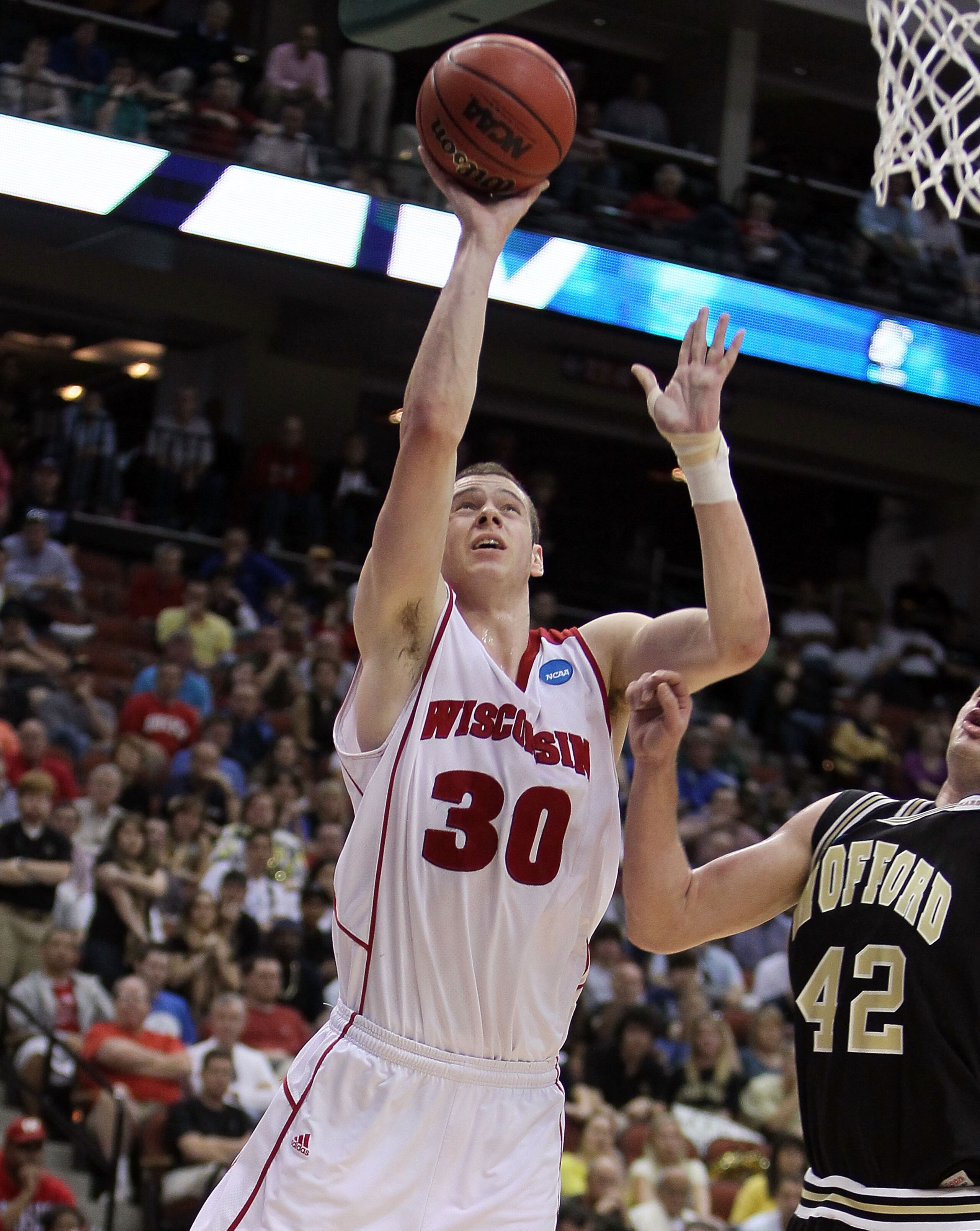 JACKSONVILLE, FL - MARCH 19:  Jon Leuer #30 of the Wisconsin Badgers shoots the ball against the Wofford Terriers during the first round of the 2010 NCAA men's basketball tournament at Jacksonville Veteran's Memorial Arena on March 19, 2010 in Jacksonvill