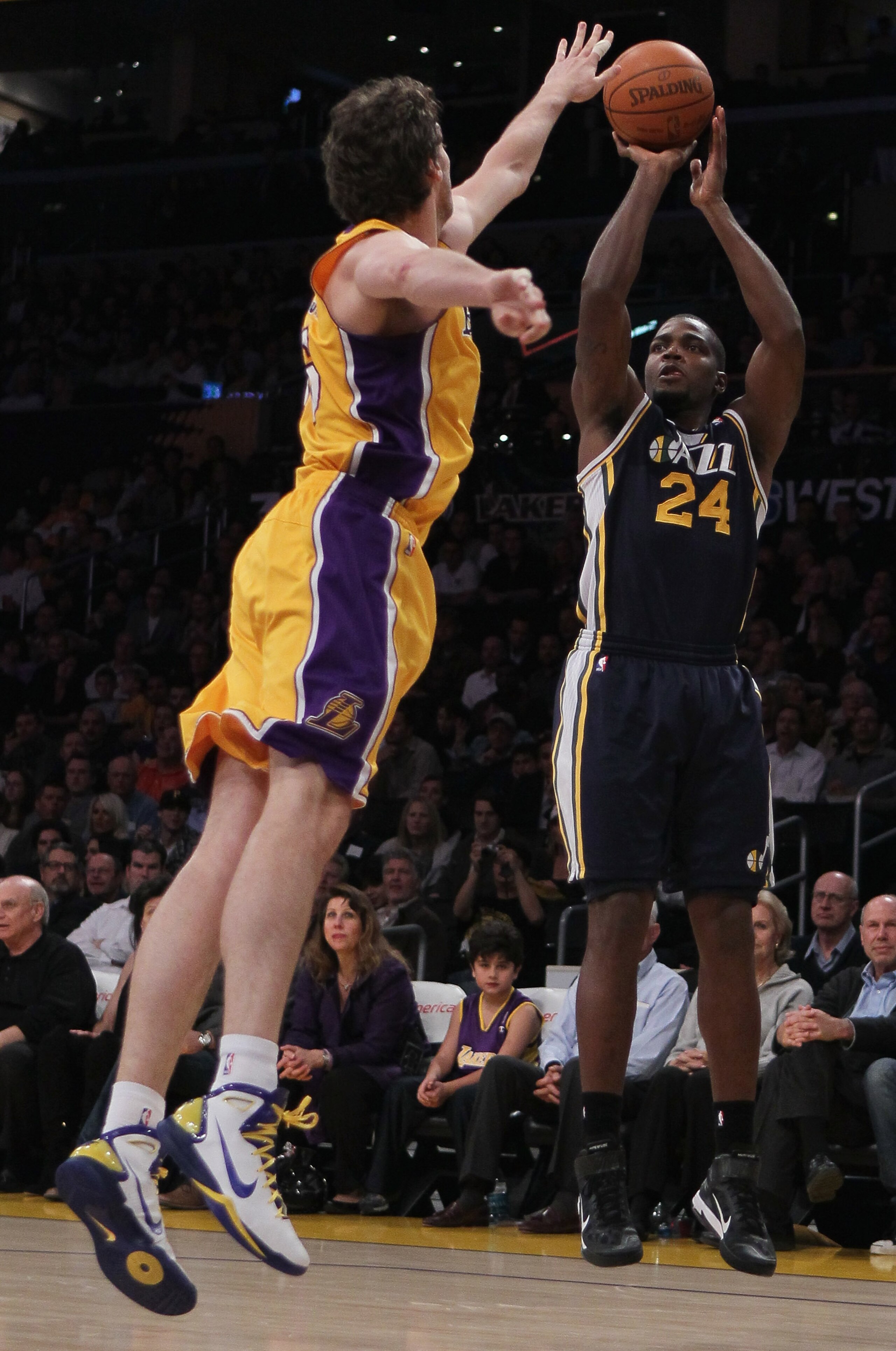LOS ANGELES, CA - JANUARY 25: Paul Millsap #24 of the Utah Jazz shoots over Pau Gasol #16 of the Los Angeles Lakers in the first half at Staples Center on January 25, 2011 in Los Angeles, California. NOTE TO USER: User expressly acknowledges and agrees t LOS ANGELES, CA - JANUARY 25: Paul Millsap #24 of the Utah Jazz shoots over Pau Gasol #16 of the Los Angeles Lakers in the first half at Staples Center on January 25, 2011 in Los Angeles, California. NOTE TO USER: User expressly acknowledges and agrees t