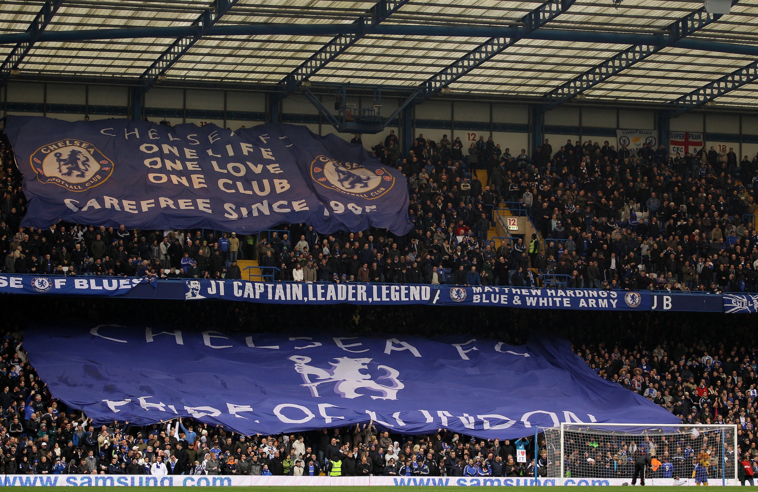 LONDON, ENGLAND - FEBRUARY 19: Chelsea fans cheer on their team prior to kickoff during the FA Cup sponsored by E.ON 4th round replay match between Chelsea and Everton at Stamford Bridge on February 19, 2011 in London, England. (Photo by Richard Heathco LONDON, ENGLAND - FEBRUARY 19: Chelsea fans cheer on their team prior to kickoff during the FA Cup sponsored by E.ON 4th round replay match between Chelsea and Everton at Stamford Bridge on February 19, 2011 in London, England. (Photo by Richard Heathco