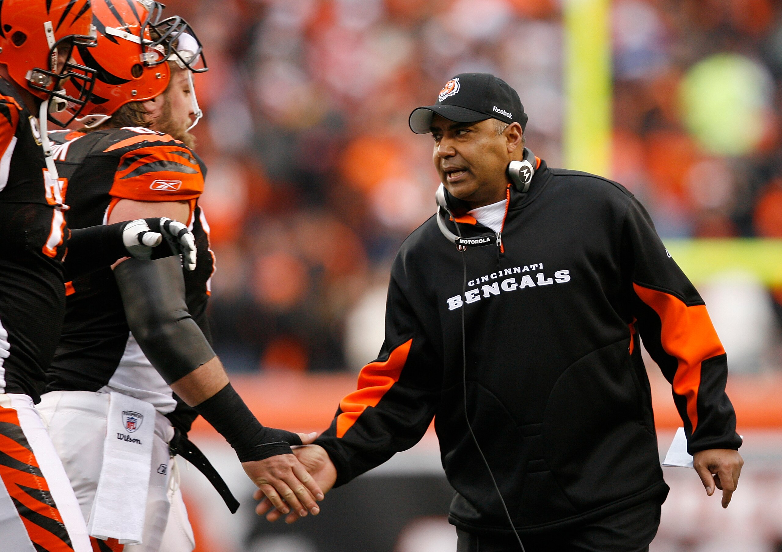CINCINNATI - DECEMBER 27: Marvin Lewis head coach of the Cincinnati Bengals shakes hands with his players during their game against the Kansas City Chiefs in their NFL game at Paul Brown Stadium December 27, 2009 in Cincinnati, Ohio.    (Photo by John Som