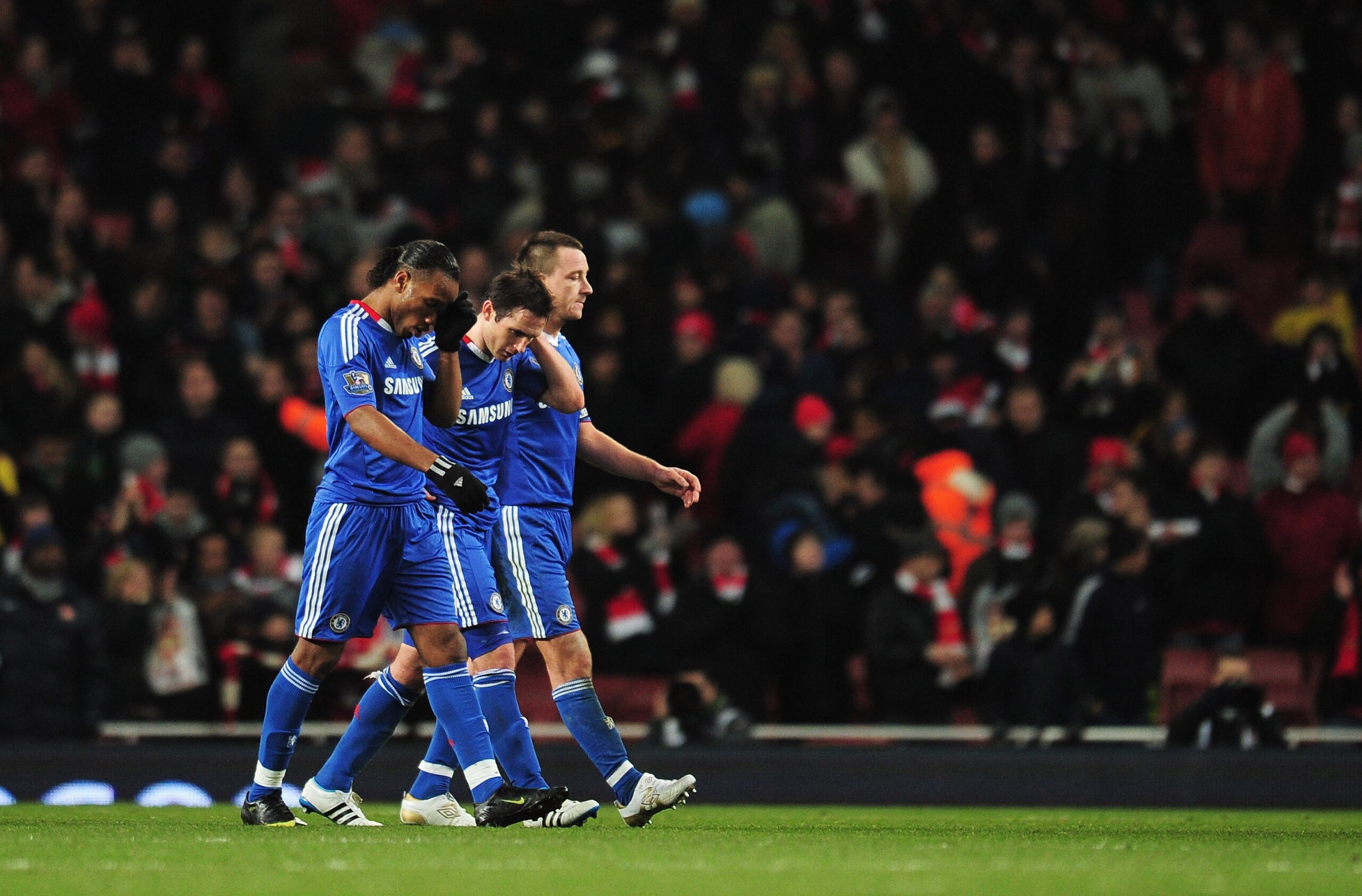 LONDON, ENGLAND - DECEMBER 27: (L-R) Didier Drogba, Frank Lampard and John Terry of Chelsea walk off dejected after the Barclays Premier League match between Arsenal and Chelsea at the Emirates Stadium on December 27, 2010 in London, England. (Photo by S LONDON, ENGLAND - DECEMBER 27: (L-R) Didier Drogba, Frank Lampard and John Terry of Chelsea walk off dejected after the Barclays Premier League match between Arsenal and Chelsea at the Emirates Stadium on December 27, 2010 in London, England. (Photo by S