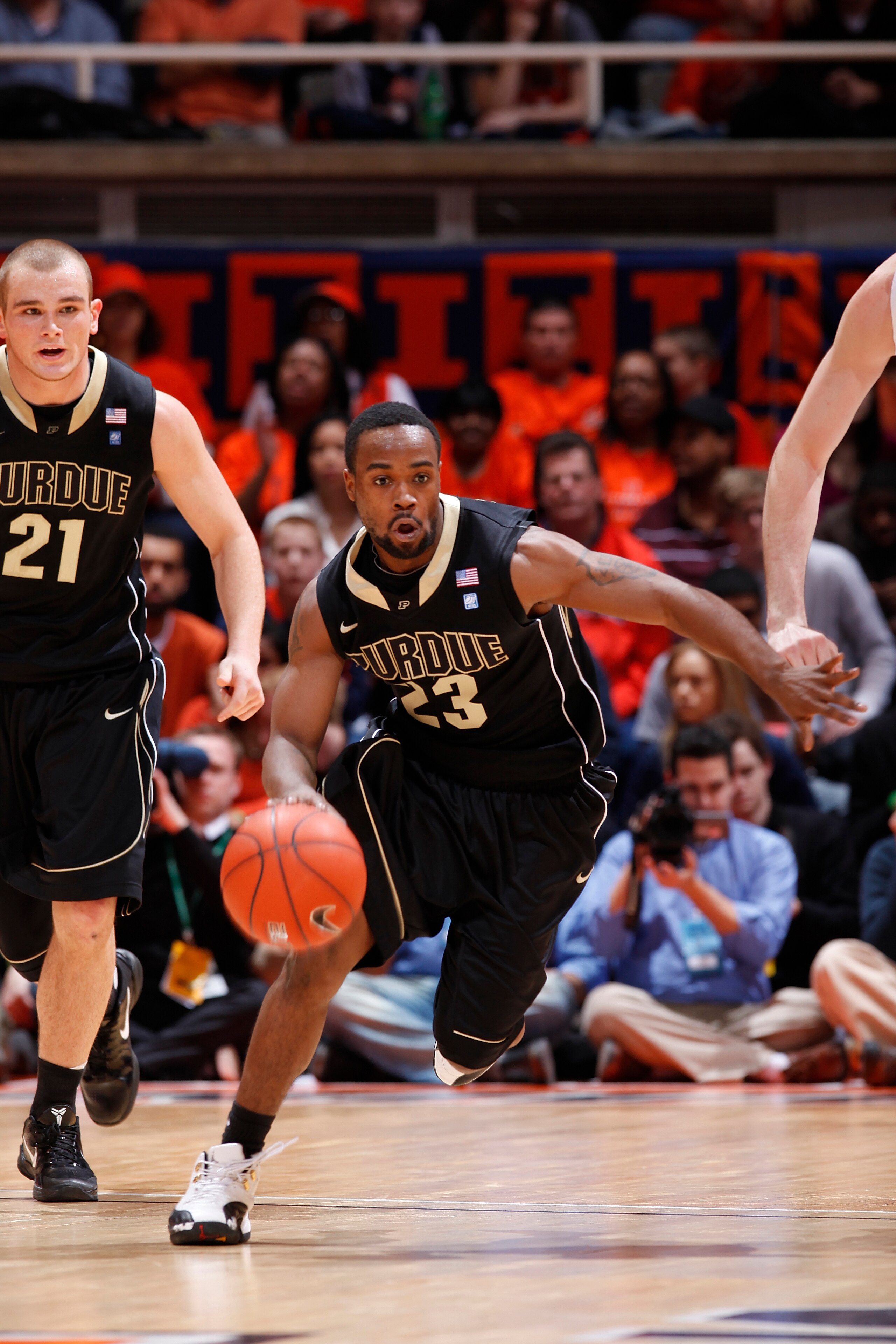 CHAMPAIGN, IL - FEBRUARY 13: Lewis Jackson #23 of the Purdue Boilermakers leads a fast break against the Illinois Fighting Illini at Assembly Hall on February 13, 2011 in Champaign, Illinois. Purdue defeated Illinois 81-70. (Photo by Joe Robbins/Getty Ima CHAMPAIGN, IL - FEBRUARY 13: Lewis Jackson #23 of the Purdue Boilermakers leads a fast break against the Illinois Fighting Illini at Assembly Hall on February 13, 2011 in Champaign, Illinois. Purdue defeated Illinois 81-70. (Photo by Joe Robbins/Getty Ima