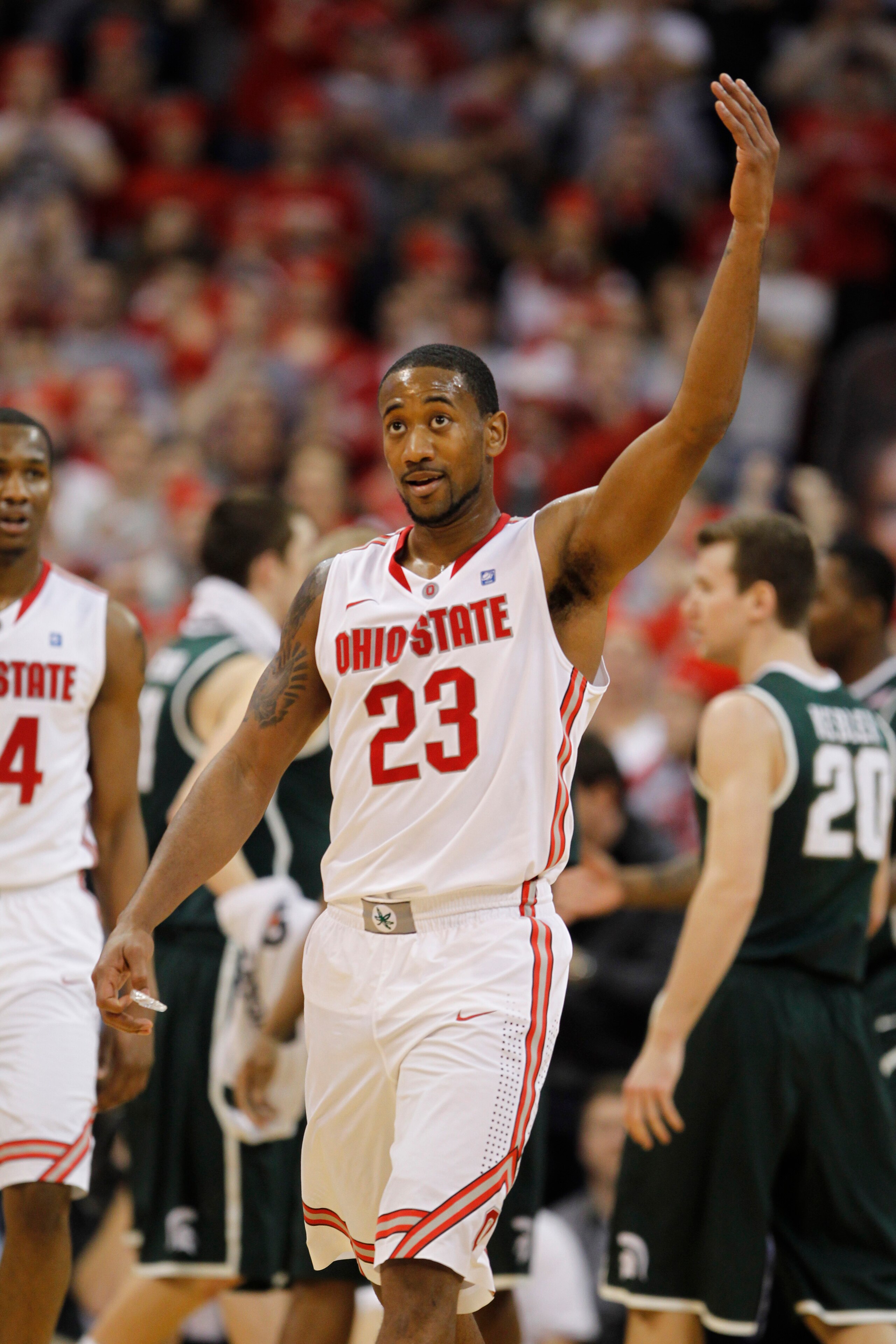 COLUMBUS, OH - FEBRUARY 15: David Lighty #23 of the Ohio State Buckeyes reacts while playing the Michigan State Spartans on February 15, 2011 at Value City Arena in Columbus, Ohio. (Photo by Gregory Shamus/Getty Images) COLUMBUS, OH - FEBRUARY 15: David Lighty #23 of the Ohio State Buckeyes reacts while playing the Michigan State Spartans on February 15, 2011 at Value City Arena in Columbus, Ohio. (Photo by Gregory Shamus/Getty Images)
