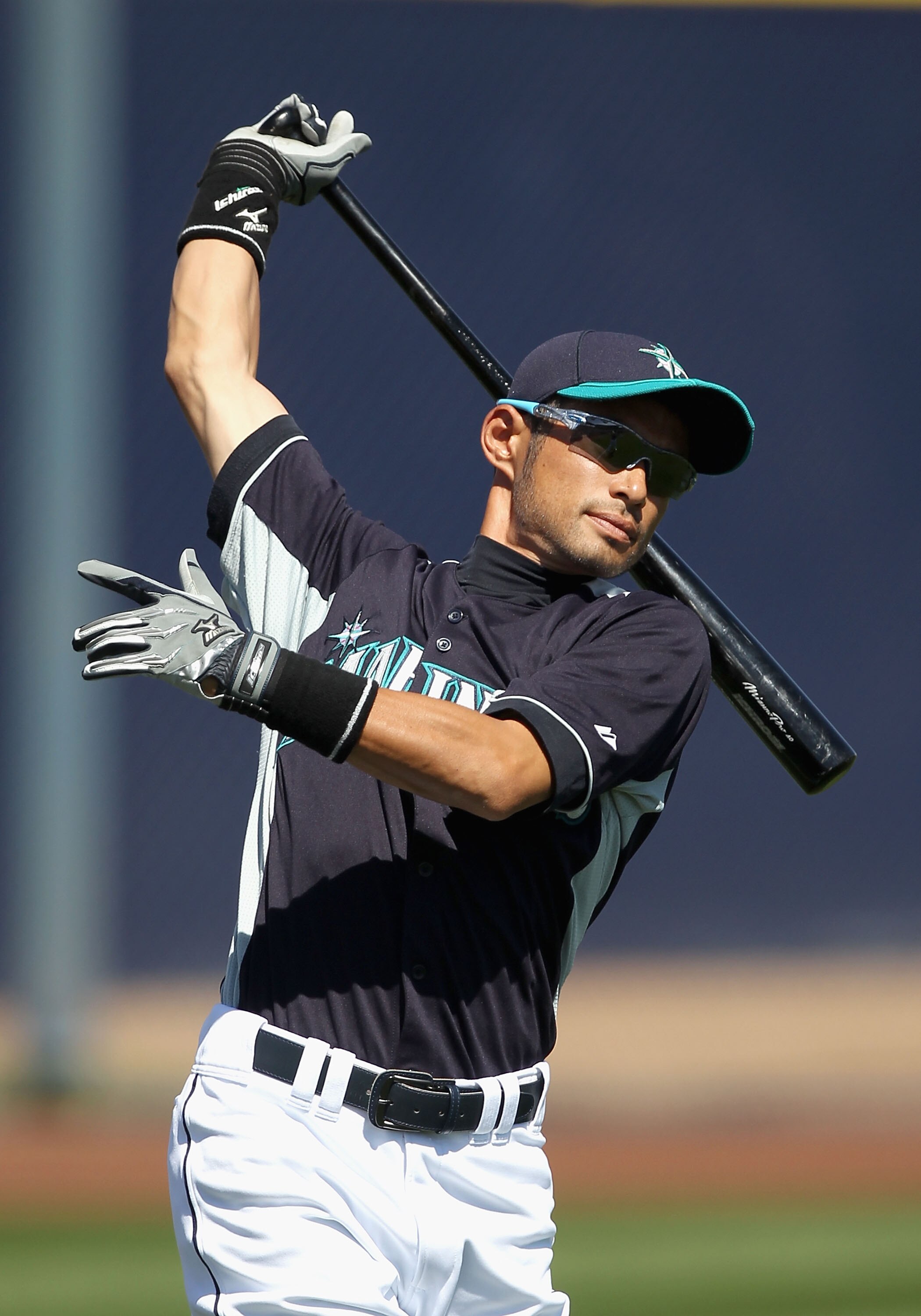 PEORIA, AZ - MARCH 12:  Ichiro Suzuki #51 of the Seattle Mariners warms up before the spring training game against the Oakland Athletics at Peoria Stadium on March 12, 2011 in Peoria, Arizona.  (Photo by Christian Petersen/Getty Images)