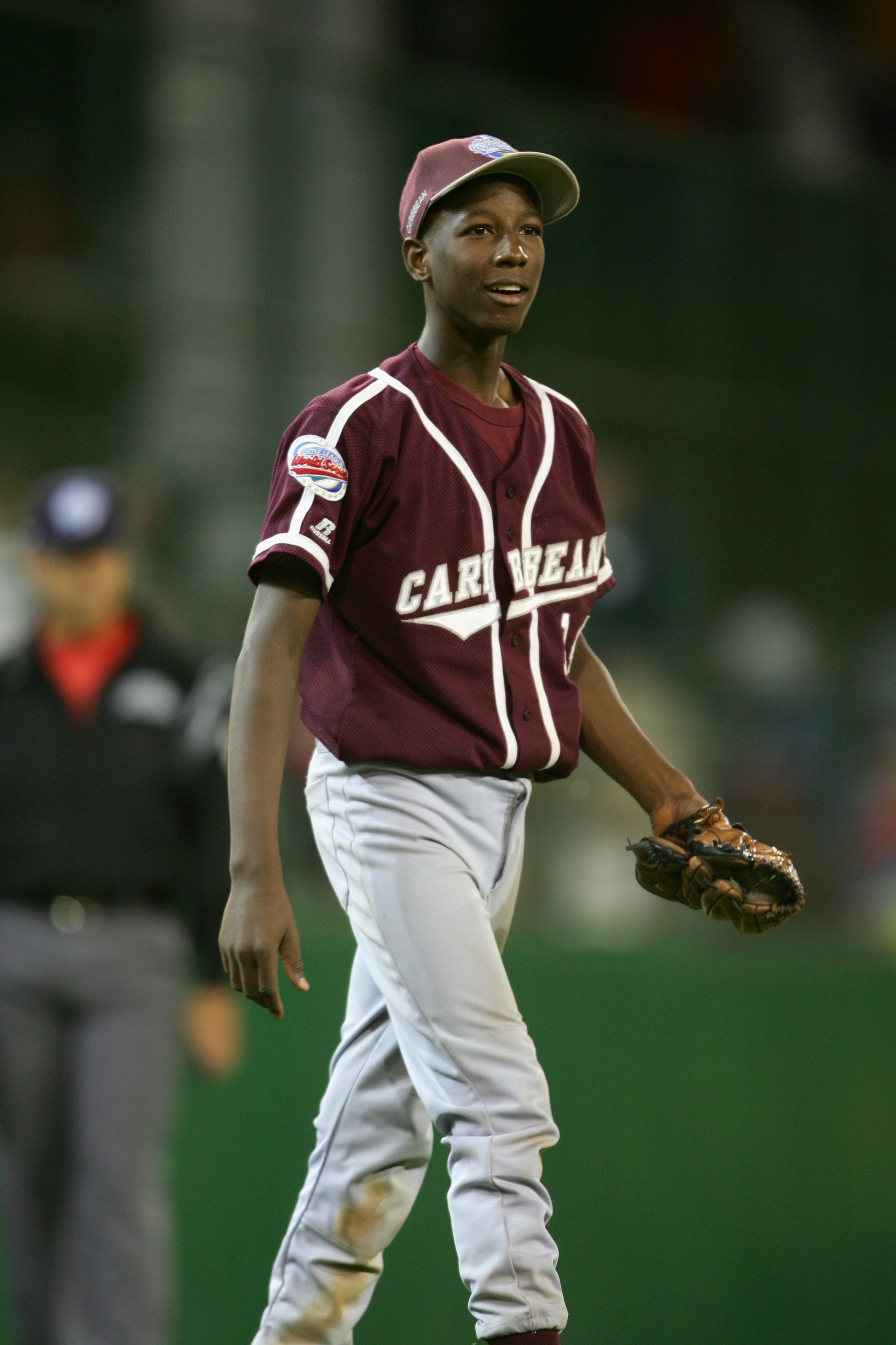 SOUTH WILLIAMSPORT, PA - AUGUST 27: Pitcher Jurickson Profar #14 of Curacao (representing the Caribbean leagues) walks on the field during the International Final of the Little League World Series against Japan (representing the Asian leagues) on August SOUTH WILLIAMSPORT, PA - AUGUST 27: Pitcher Jurickson Profar #14 of Curacao (representing the Caribbean leagues) walks on the field during the International Final of the Little League World Series against Japan (representing the Asian leagues) on August