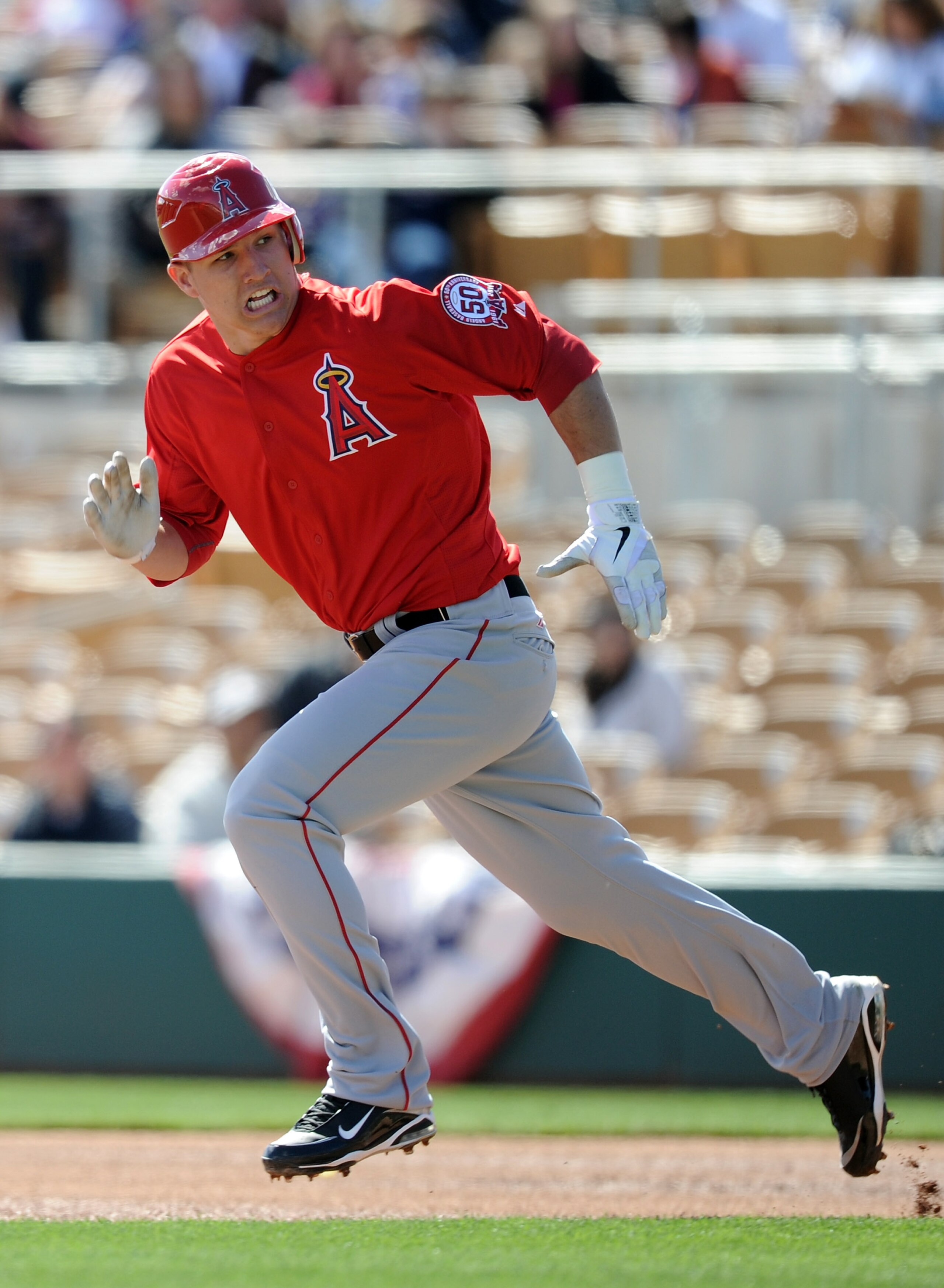 PHOENIX, AZ - FEBRUARY 27: Mike Trout #90 of the Los Angeles Angels of Anaheim runs to second base against the Los Angeles Dodgers during spring training at Camelback Ranch on February 27, 2011 in Phoenix, Arizona. (Photo by Harry How/Getty Images) PHOENIX, AZ - FEBRUARY 27: Mike Trout #90 of the Los Angeles Angels of Anaheim runs to second base against the Los Angeles Dodgers during spring training at Camelback Ranch on February 27, 2011 in Phoenix, Arizona. (Photo by Harry How/Getty Images)