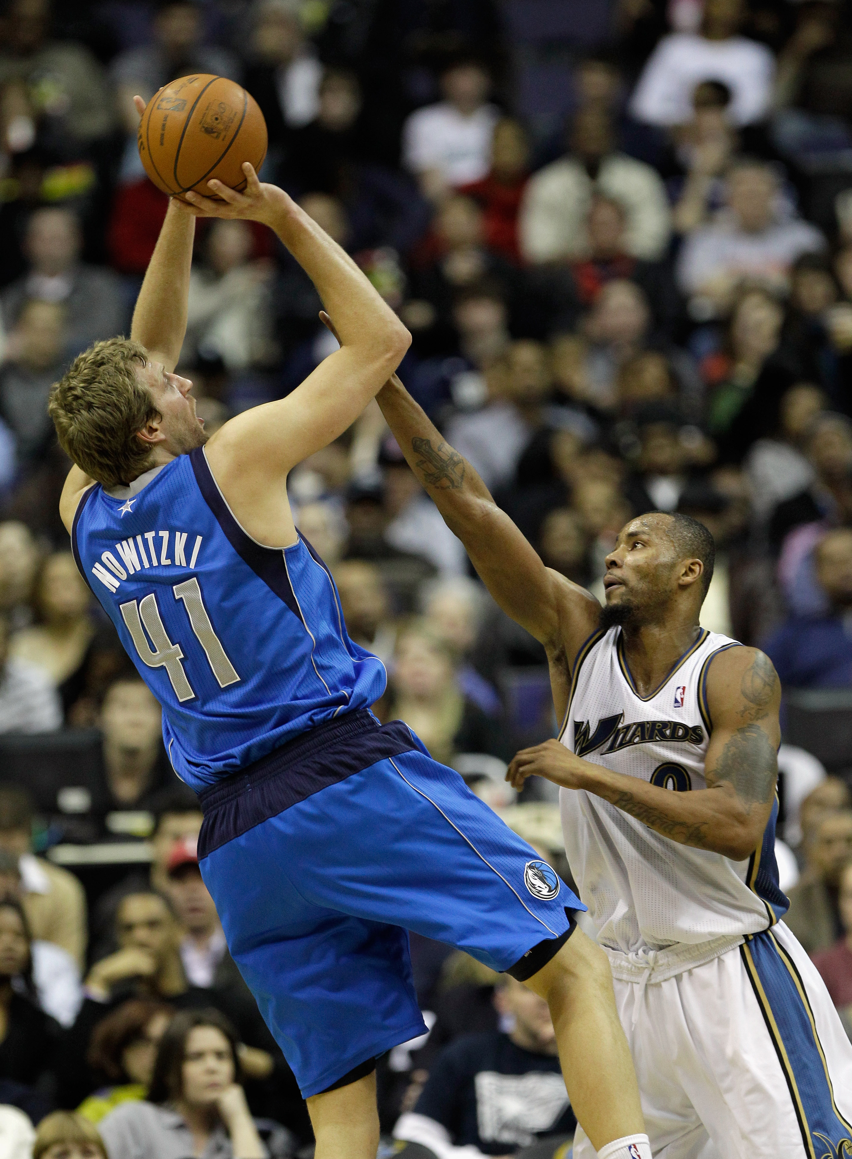 WASHINGTON, DC - FEBRUARY 26: Dirk Nowitzki #41 of the Dallas Mavericks puts up a shot in front of Rashard Lewis #9 of the Washington Wizards at the Verizon Center on February 26, 2011 in Washington, DC. NOTE TO USER: User expressly acknowledges and agree
