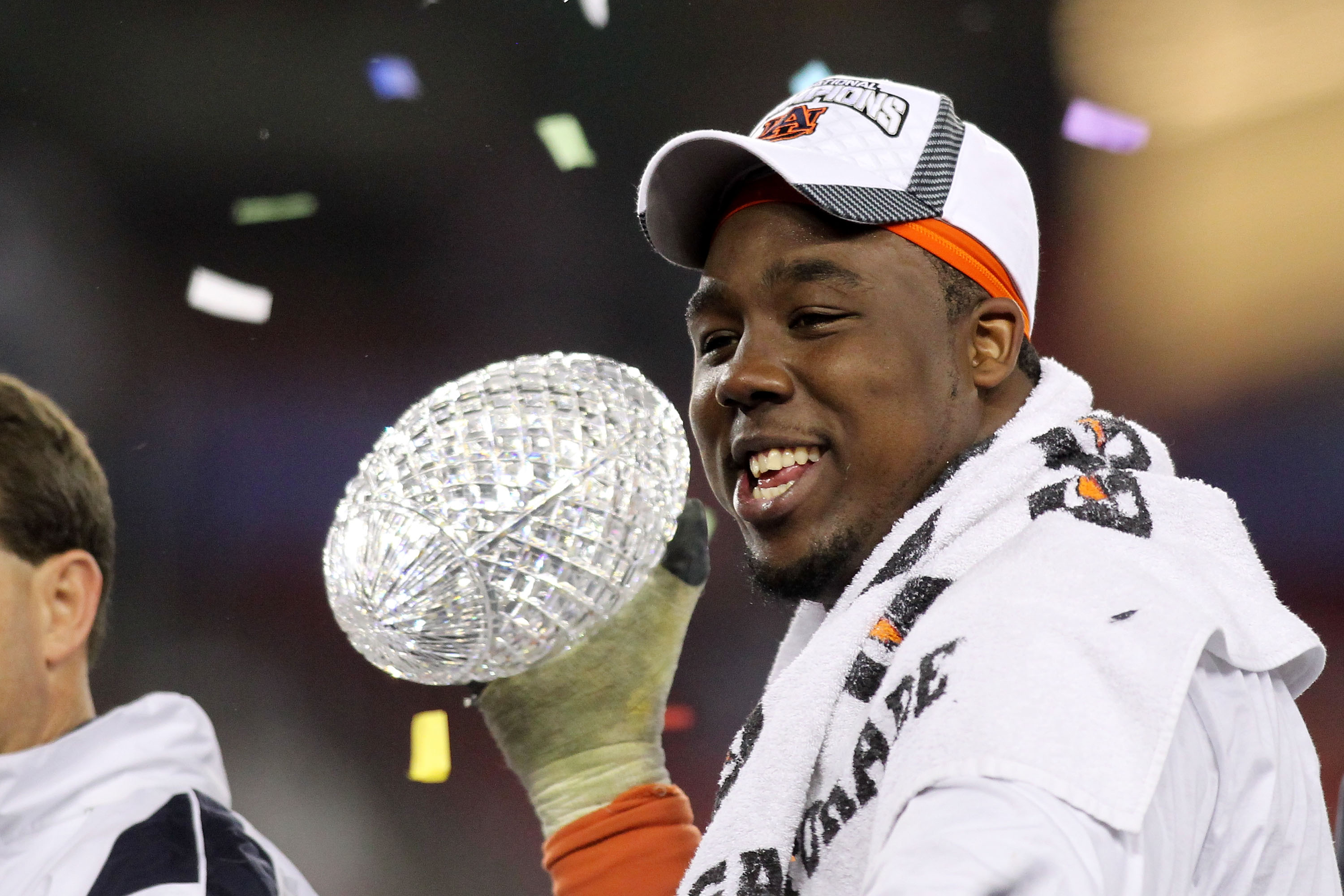 GLENDALE, AZ - JANUARY 10: Nick Fairley #90 of the Auburn Tigers celebrates the Tigers 22-19 victory against the Oregon Ducks during the Tostitos BCS National Championship Game at University of Phoenix Stadium on January 10, 2011 in Glendale, Arizona. ( GLENDALE, AZ - JANUARY 10: Nick Fairley #90 of the Auburn Tigers celebrates the Tigers 22-19 victory against the Oregon Ducks during the Tostitos BCS National Championship Game at University of Phoenix Stadium on January 10, 2011 in Glendale, Arizona. (