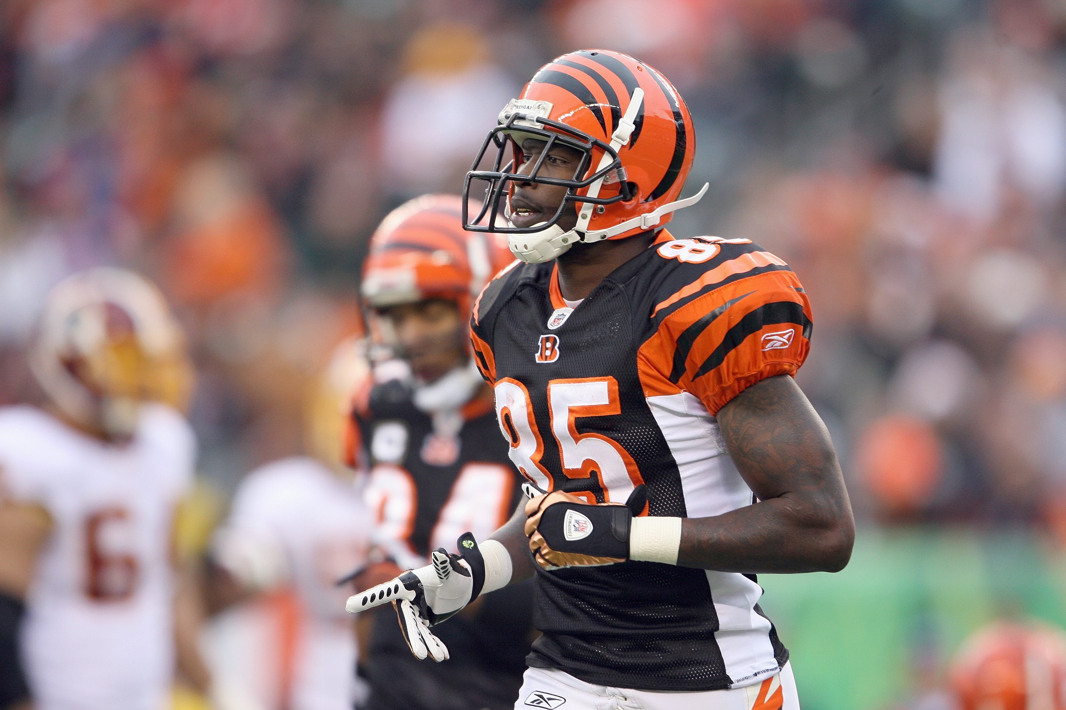 CINCINNATI - DECEMBER 14:  Chad Johnson #85 of the Cincinnati Bengals jogs on the field during the NFL game against the Washington Redskins on December 14, 2008 at Paul Brown Stadium in Cincinnati, Ohio. The Bengals won 20-13. (Photo by Andy Lyons/Getty I