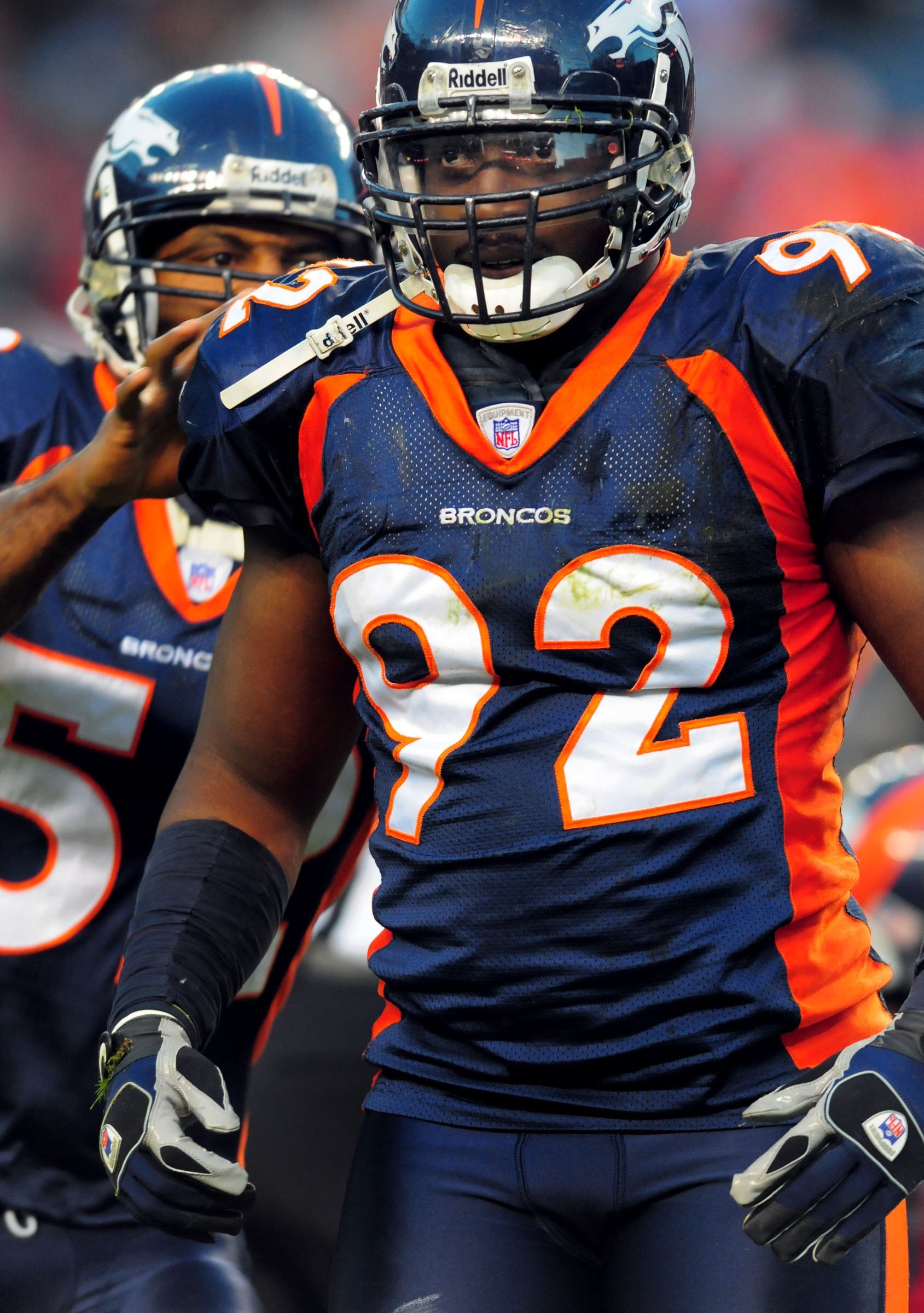 DENVER - DECEMBER 9:  Elvis Dumervil #92 of the Denver Broncos celebrates after making a play in the third quarter of the football game against the Kansas City Chiefs at Invesco Field at Mile High on December 9, 2007 in Denver, Colorado.  (Photo by Steve